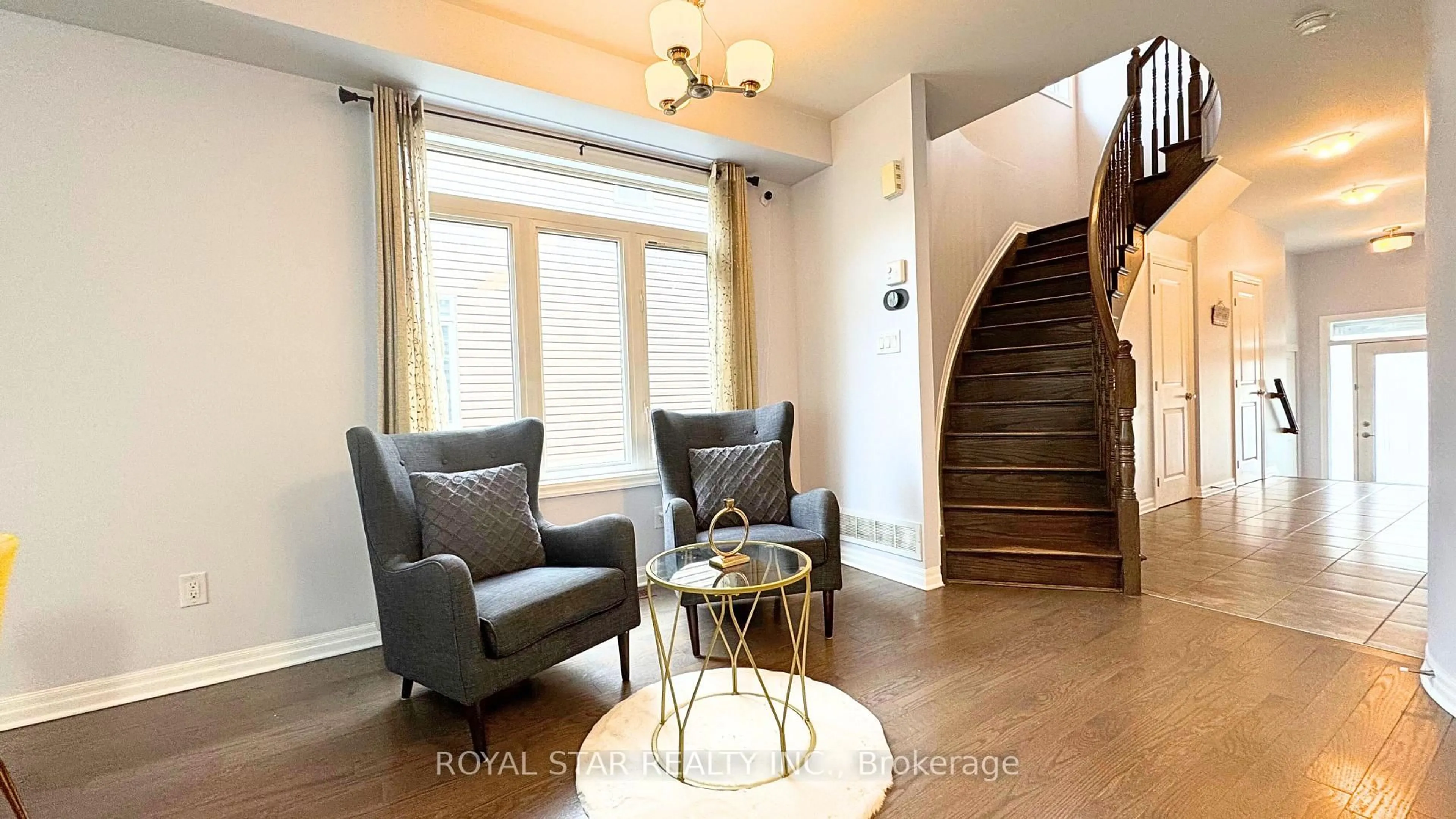 Living room with furniture, wood/laminate floor for 333 Tulum Cres, Ottawa Ontario K2S 0V9