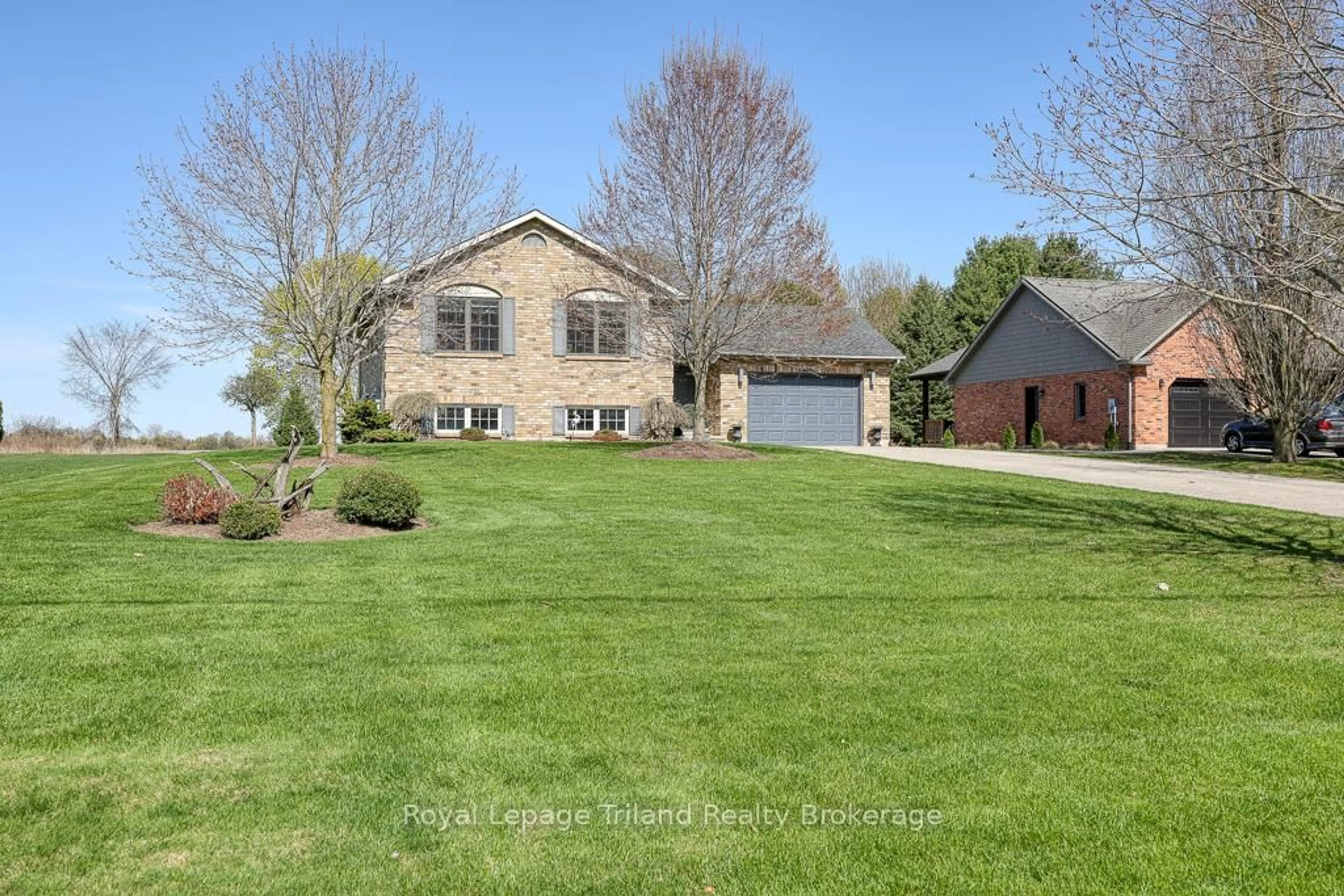 A pic from outside/outdoor area/front of a property/back of a property/a pic from drone, unknown for 32 St Ladislaus St, Norfolk Ontario N0J 1E0