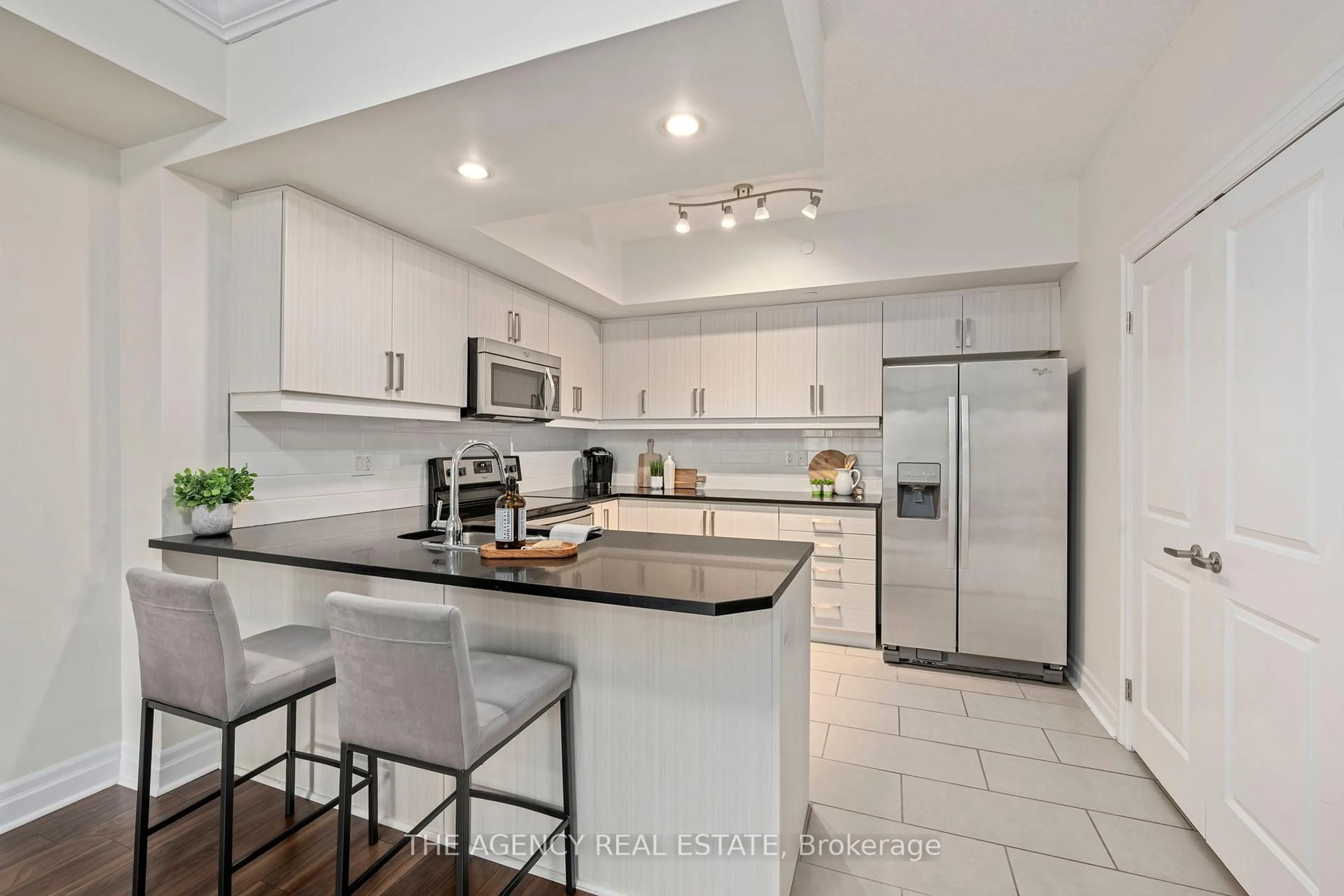 Open concept kitchen, ceramic/tile floor for 89 Ridout St #403, London South Ontario N6C 3X2