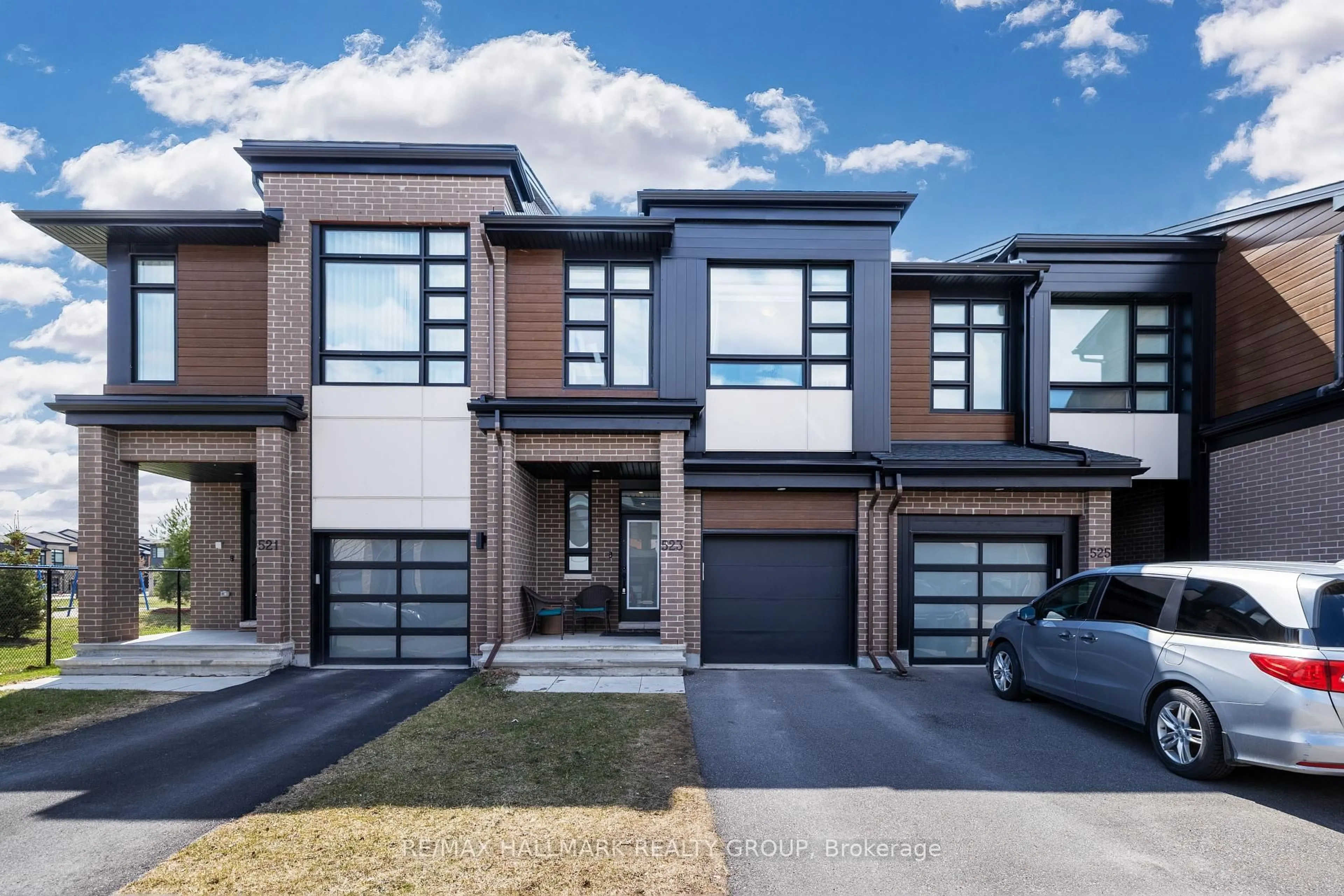 Home with brick exterior material, street for 523 Rathburn Lane, Ottawa Ontario K1T 0T4