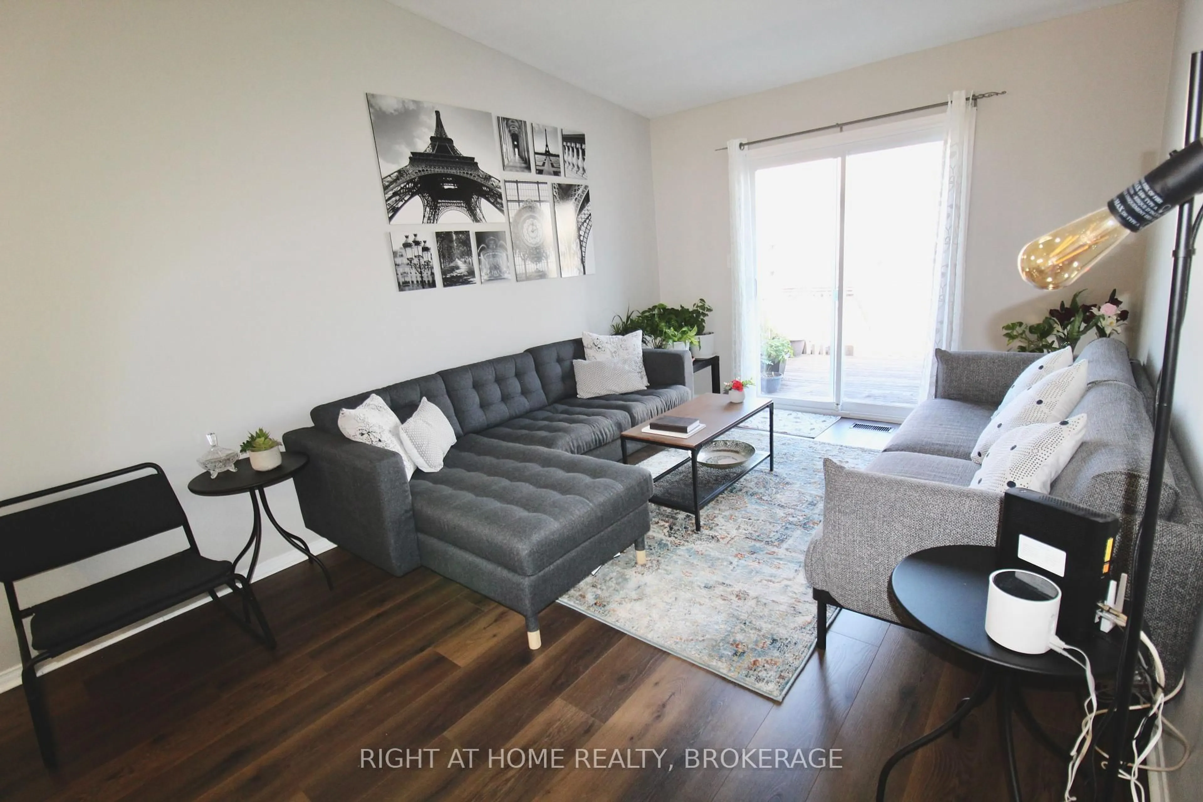 Living room with furniture, wood/laminate floor for 4451 Michael Ave, Lincoln Ontario L0R 1B5