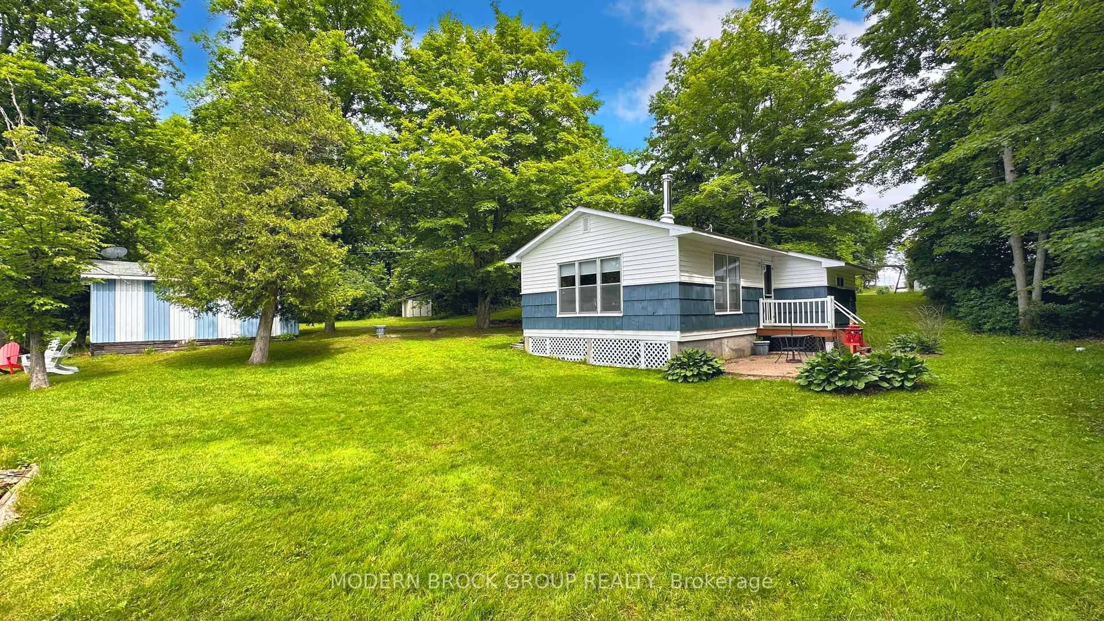 A pic from outside/outdoor area/front of a property/back of a property/a pic from drone, water/lake/river/ocean view for 94 Graham Lake Rd, Front of Yonge Ontario K0E 1R0