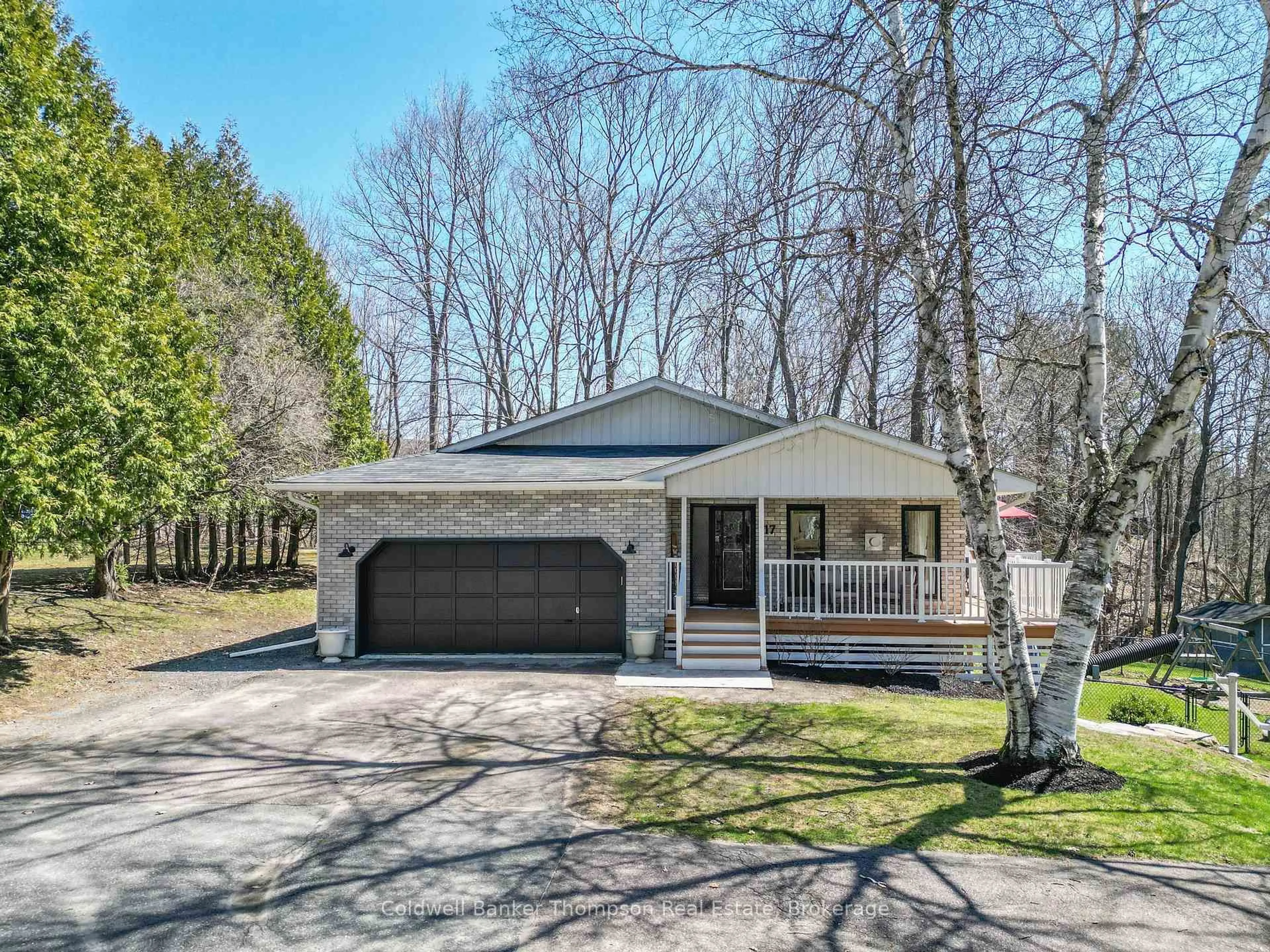 Home with vinyl exterior material, street for 17 Winona Dr, Huntsville Ontario P1H 1L9
