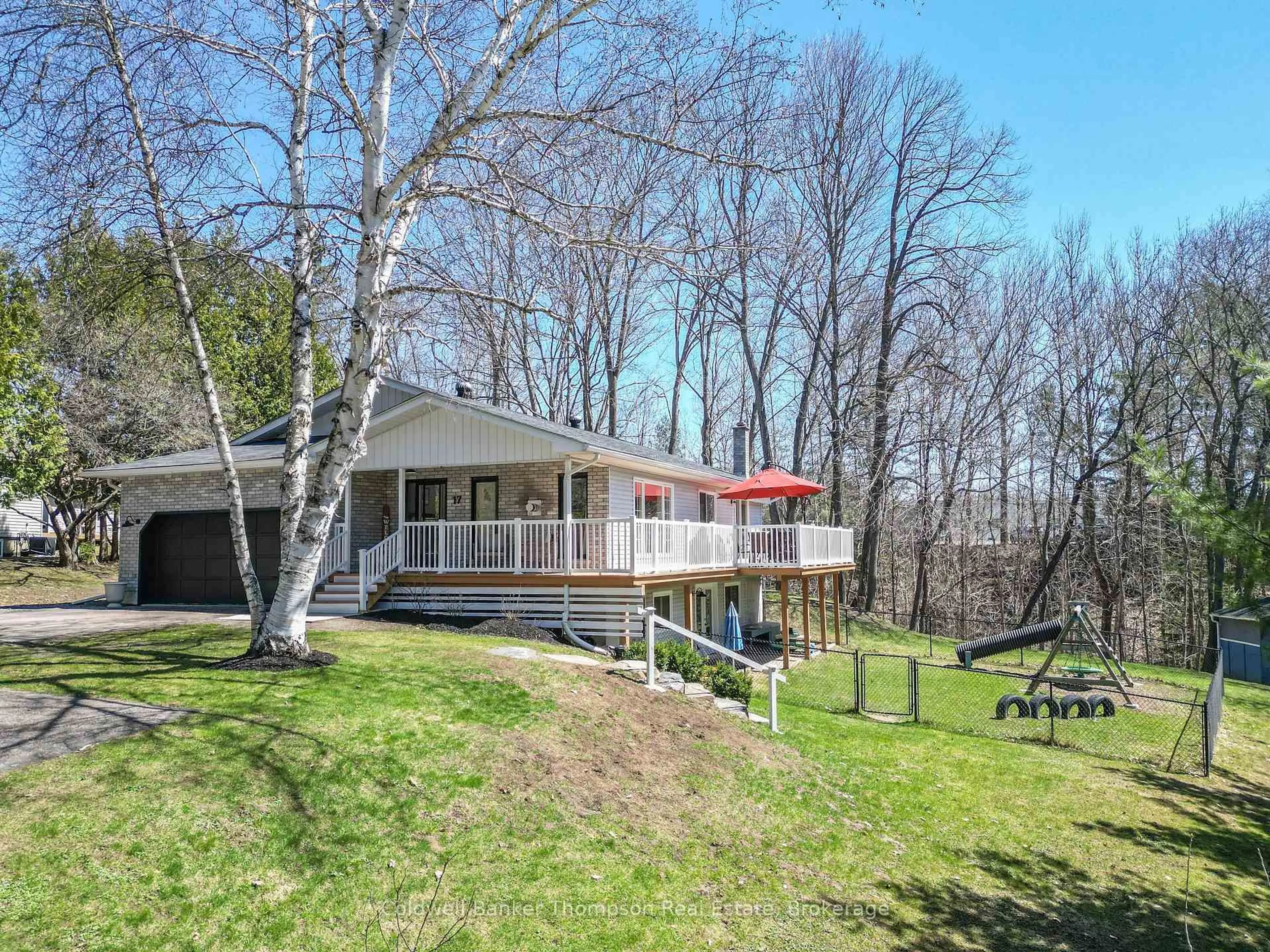 A pic from outside/outdoor area/front of a property/back of a property/a pic from drone, water/lake/river/ocean view for 17 Winona Dr, Huntsville Ontario P1H 1L9