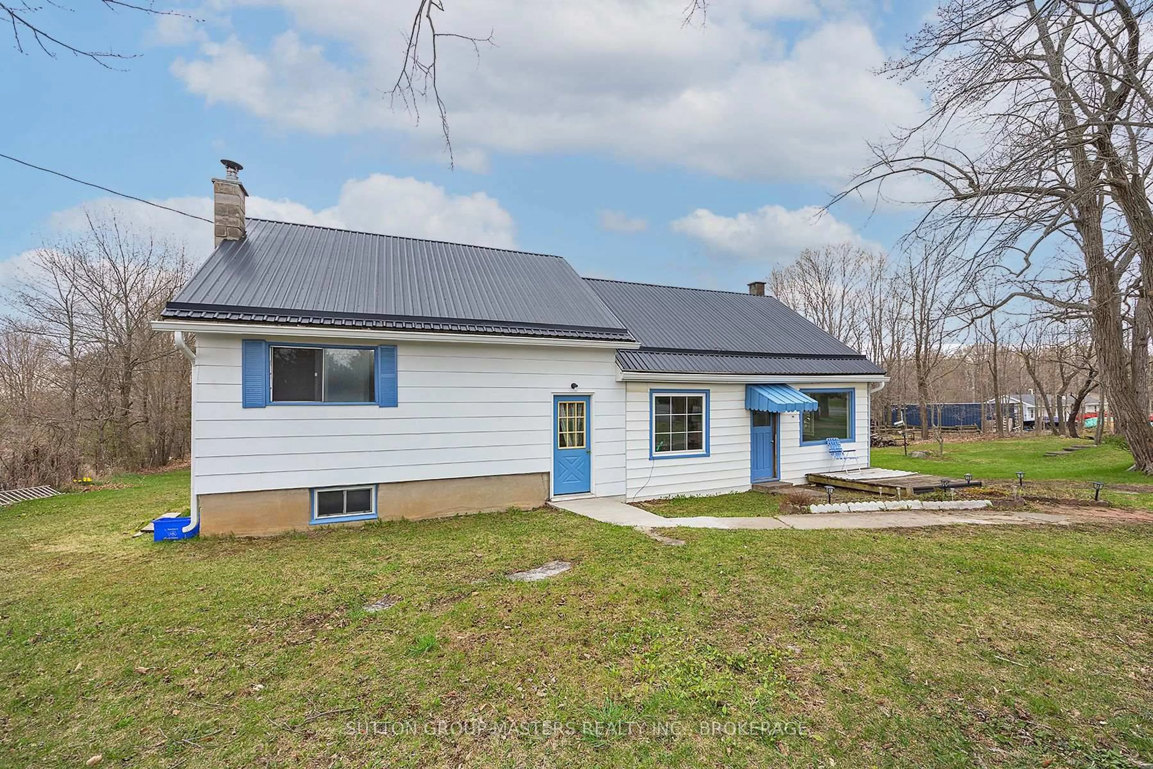 A pic from outside/outdoor area/front of a property/back of a property/a pic from drone, street for 3408 Battersea Rd, Inverary Ontario K0H 1X0