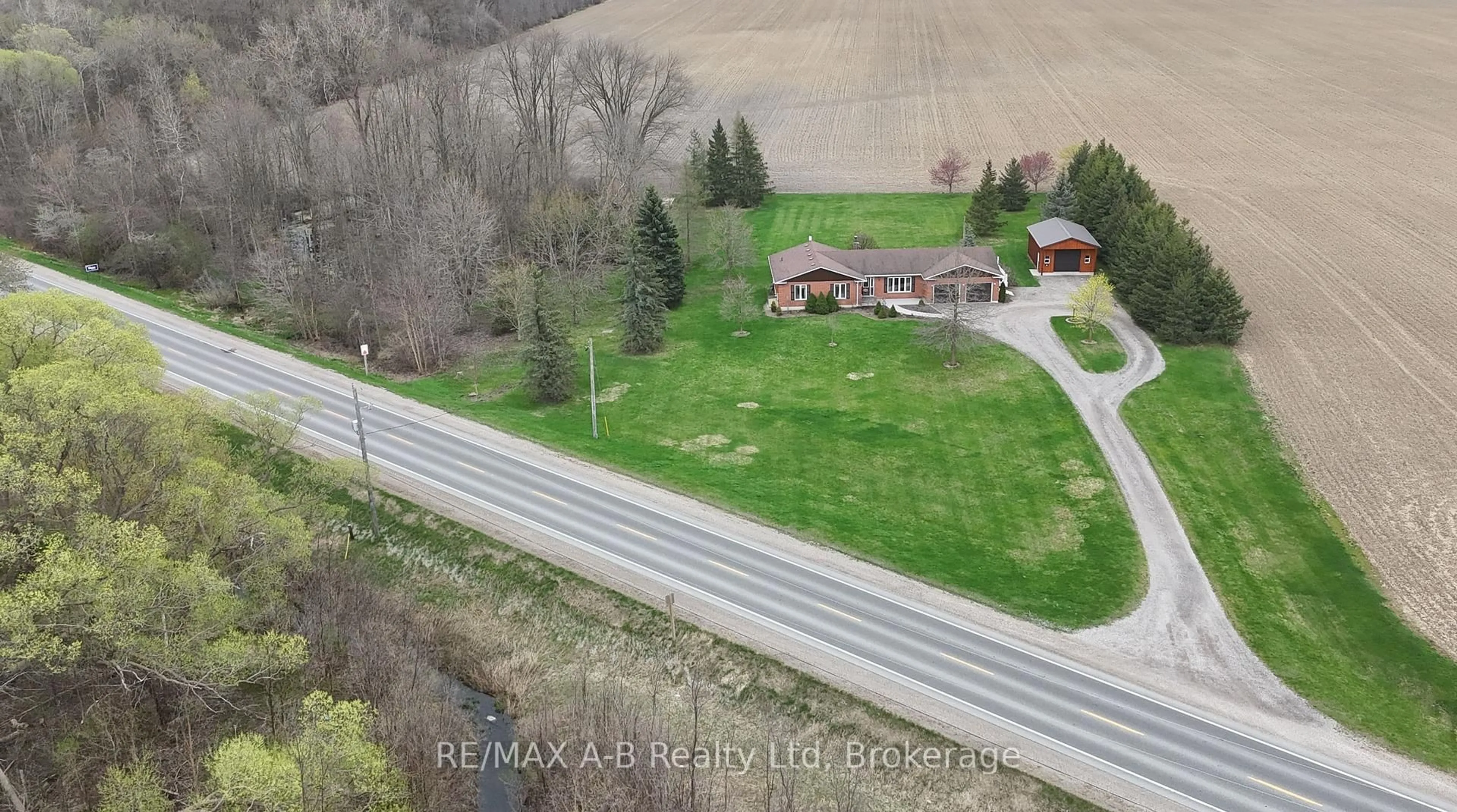 A pic from outside/outdoor area/front of a property/back of a property/a pic from drone, mountain view for 3698 Perth Rd 113 N/A, Perth South Ontario N5A 6S3