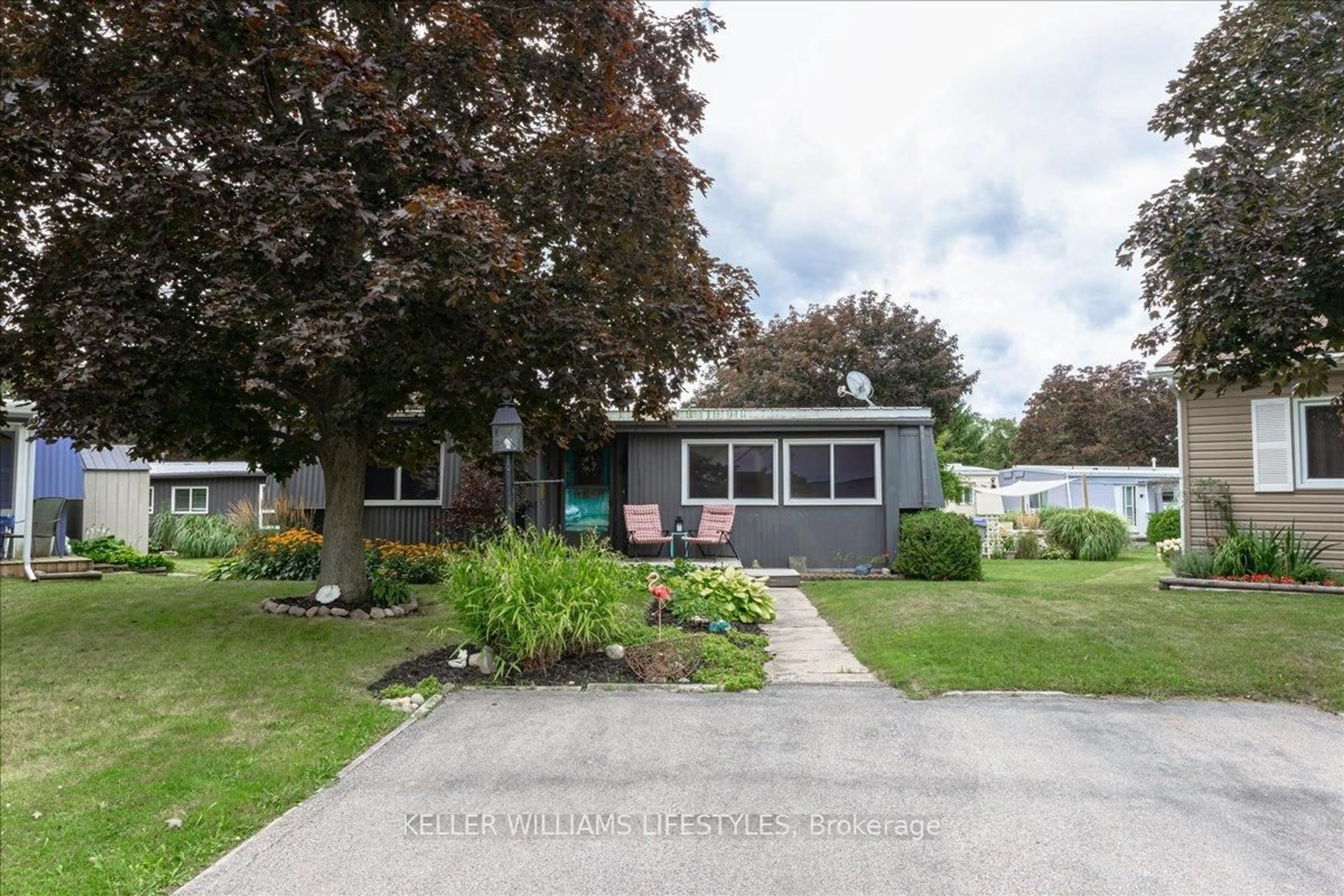 Home with vinyl exterior material, street for 244 SOUTHWIND Crt, Lambton Shores Ontario N0M 1T0