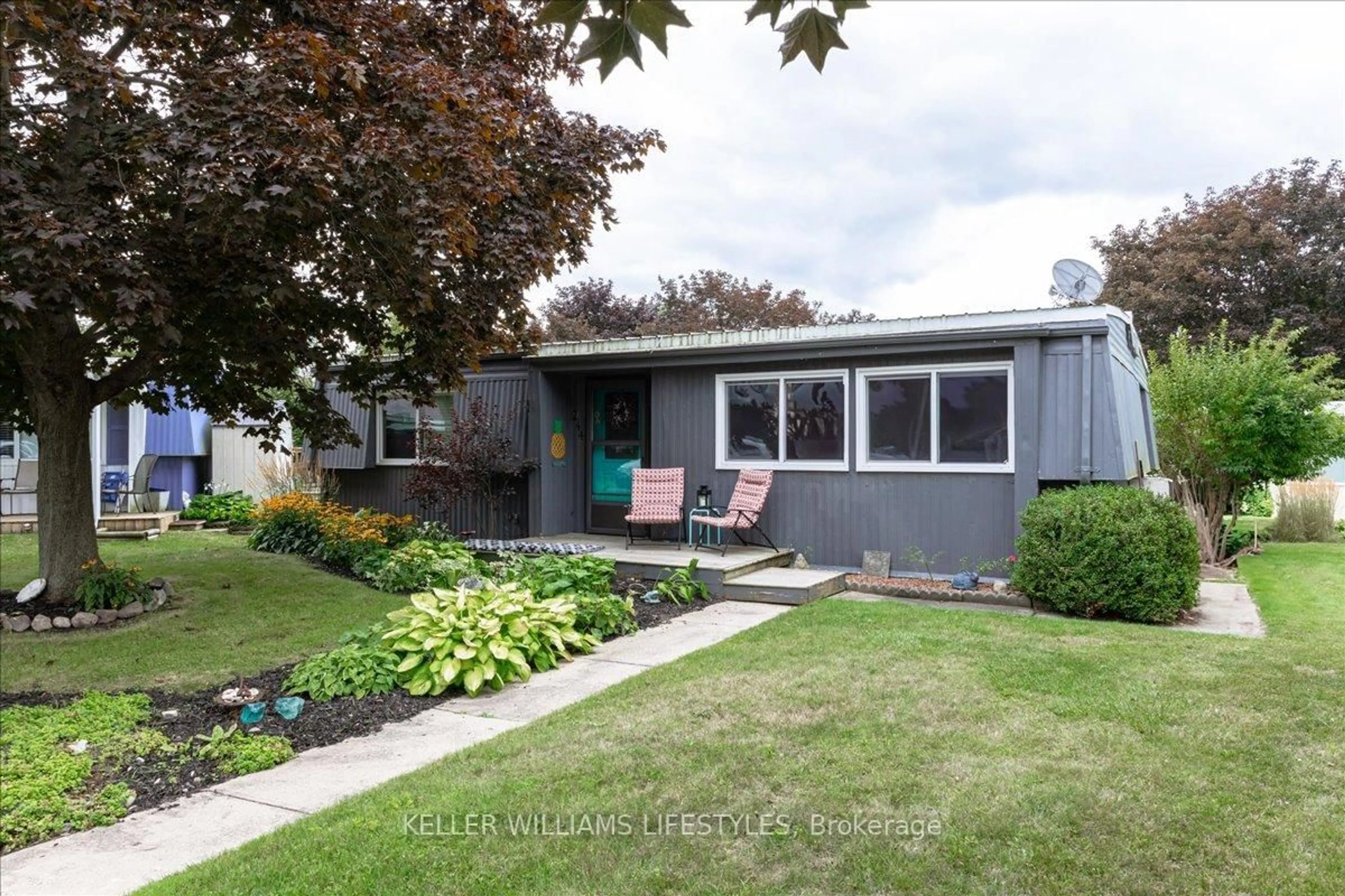 Home with vinyl exterior material, street for 244 SOUTHWIND Crt, Lambton Shores Ontario N0M 1T0