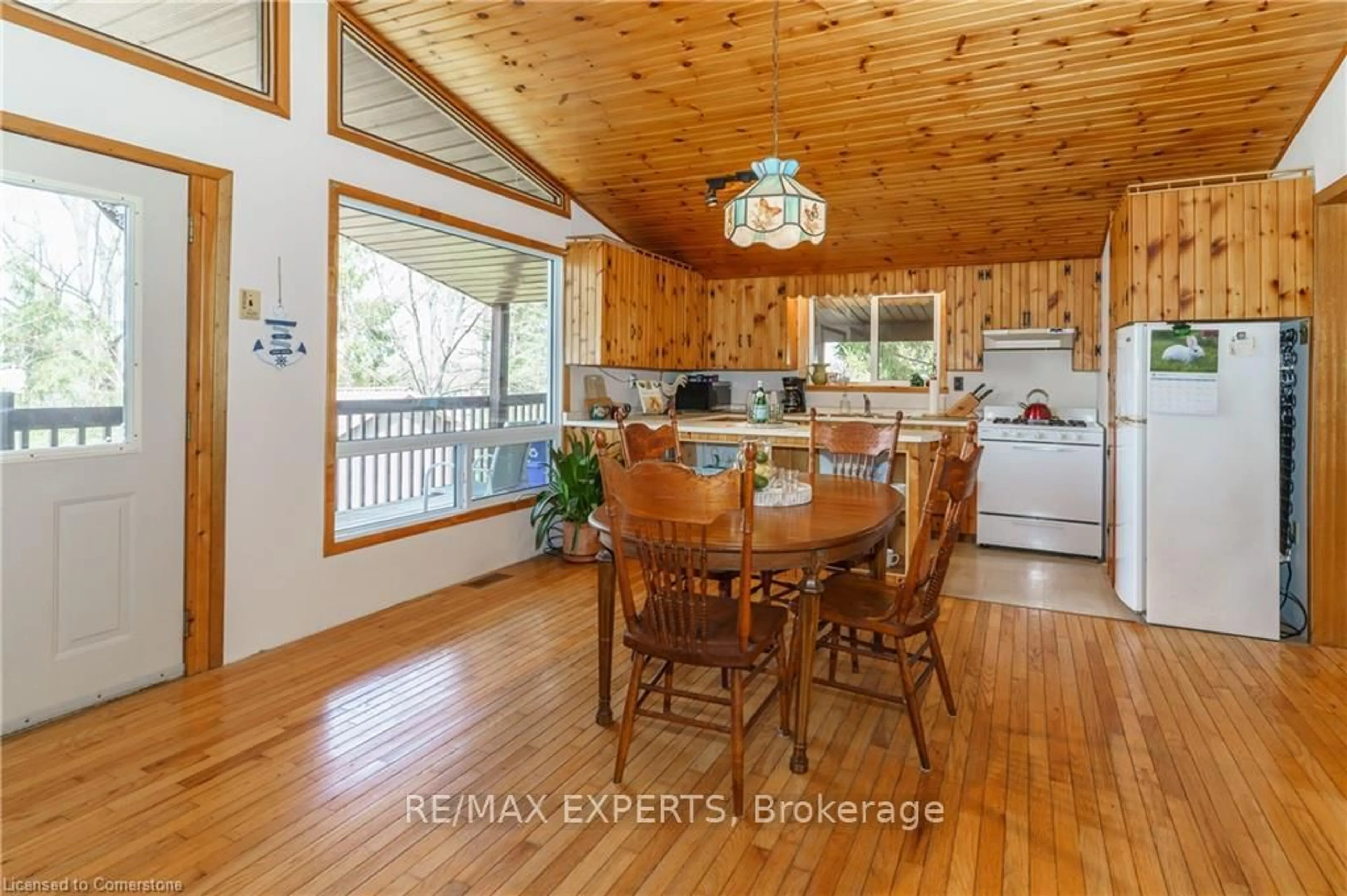 Open concept kitchen, wood/laminate floor for 86 Stoney Rd, McKellar Ontario P2A 0B5
