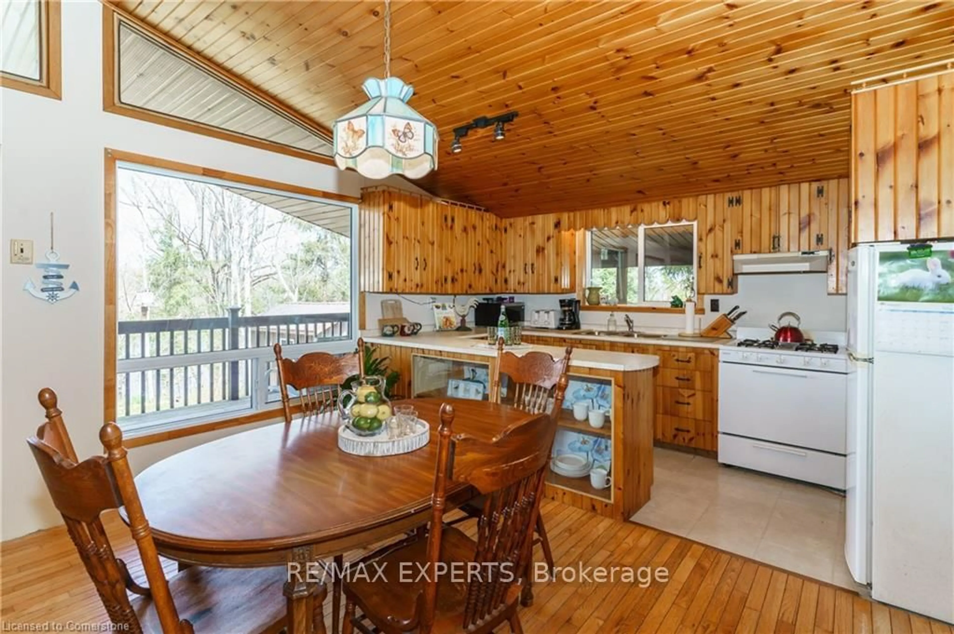 Open concept kitchen, wood/laminate floor for 86 Stoney Rd, McKellar Ontario P2A 0B5