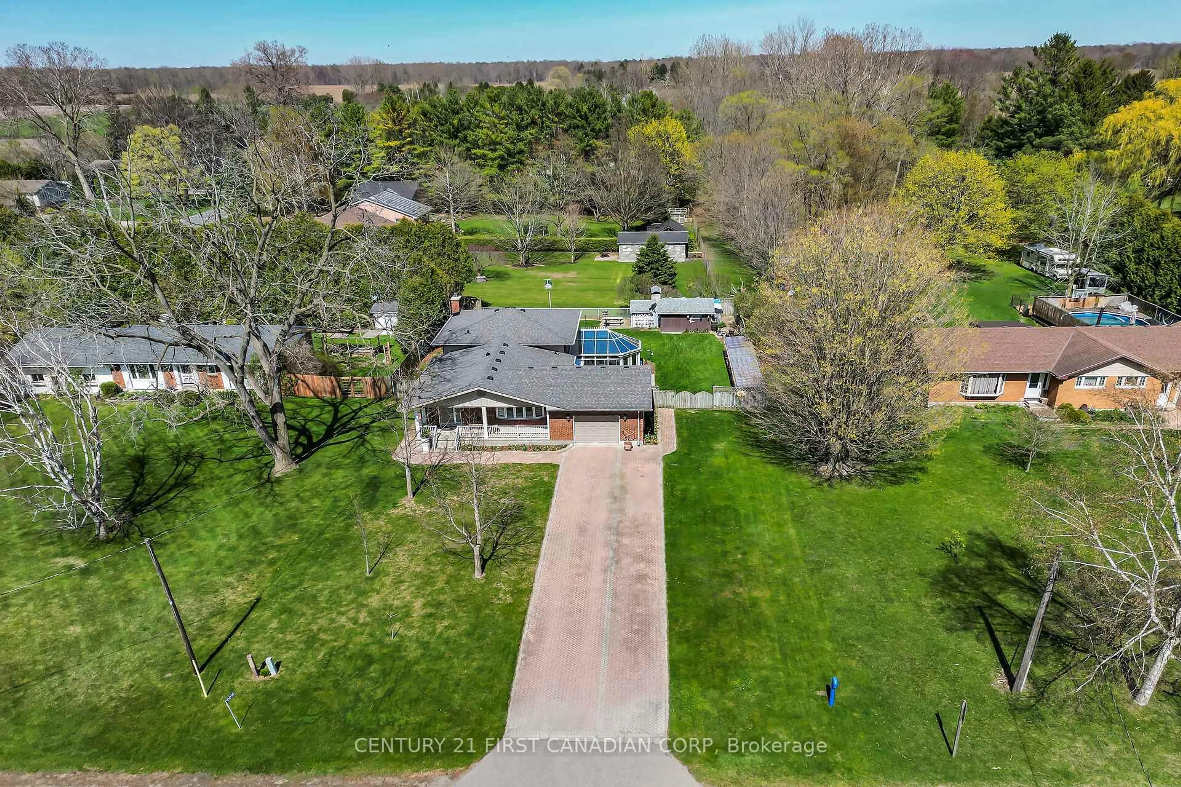 A pic from outside/outdoor area/front of a property/back of a property/a pic from drone, street for 10016 Graham Rd, West Elgin Ontario N0L 2P0