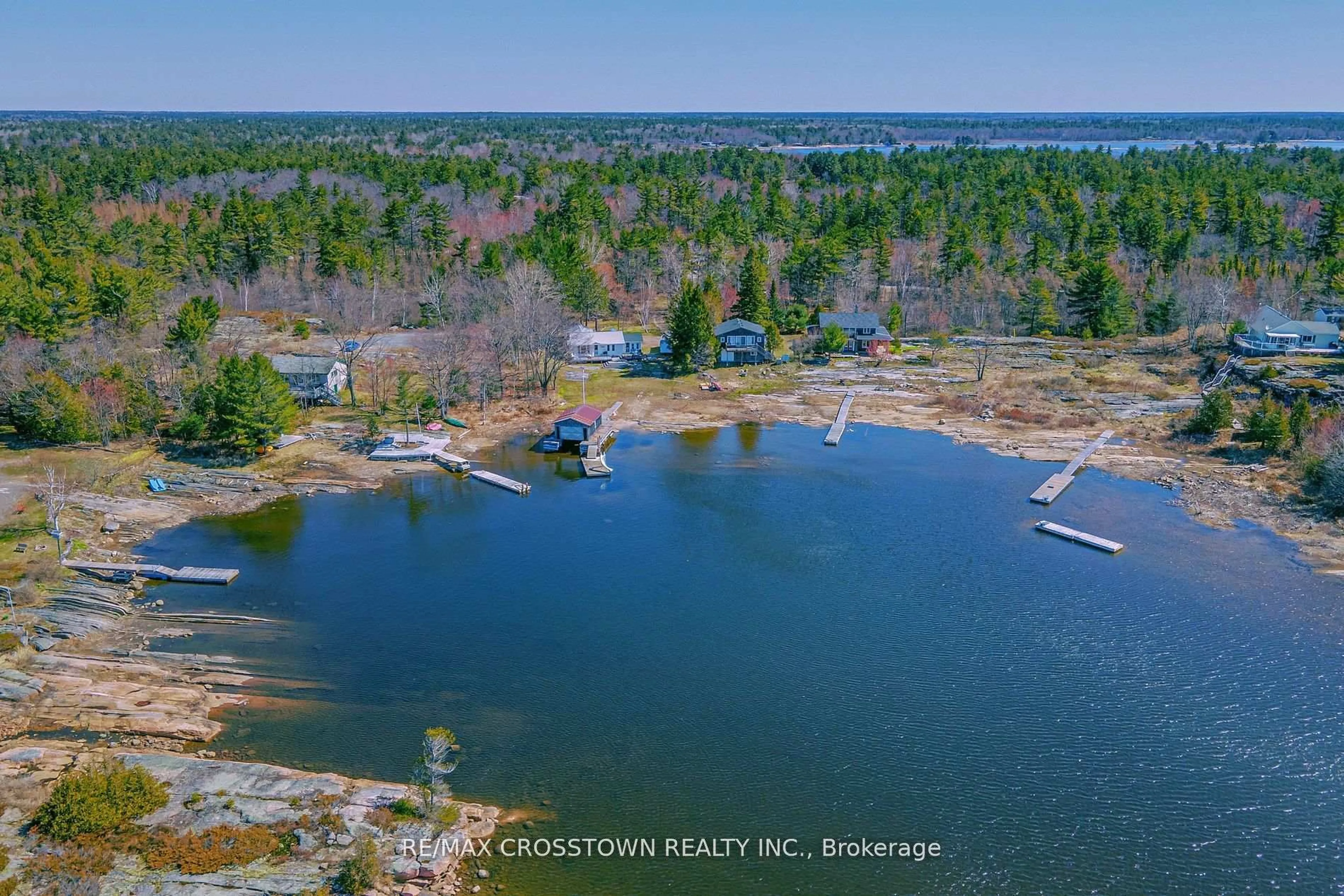 A pic from outside/outdoor area/front of a property/back of a property/a pic from drone, water/lake/river/ocean view for 5 Forsyth's Rd, Carling Ontario P0G 1G0