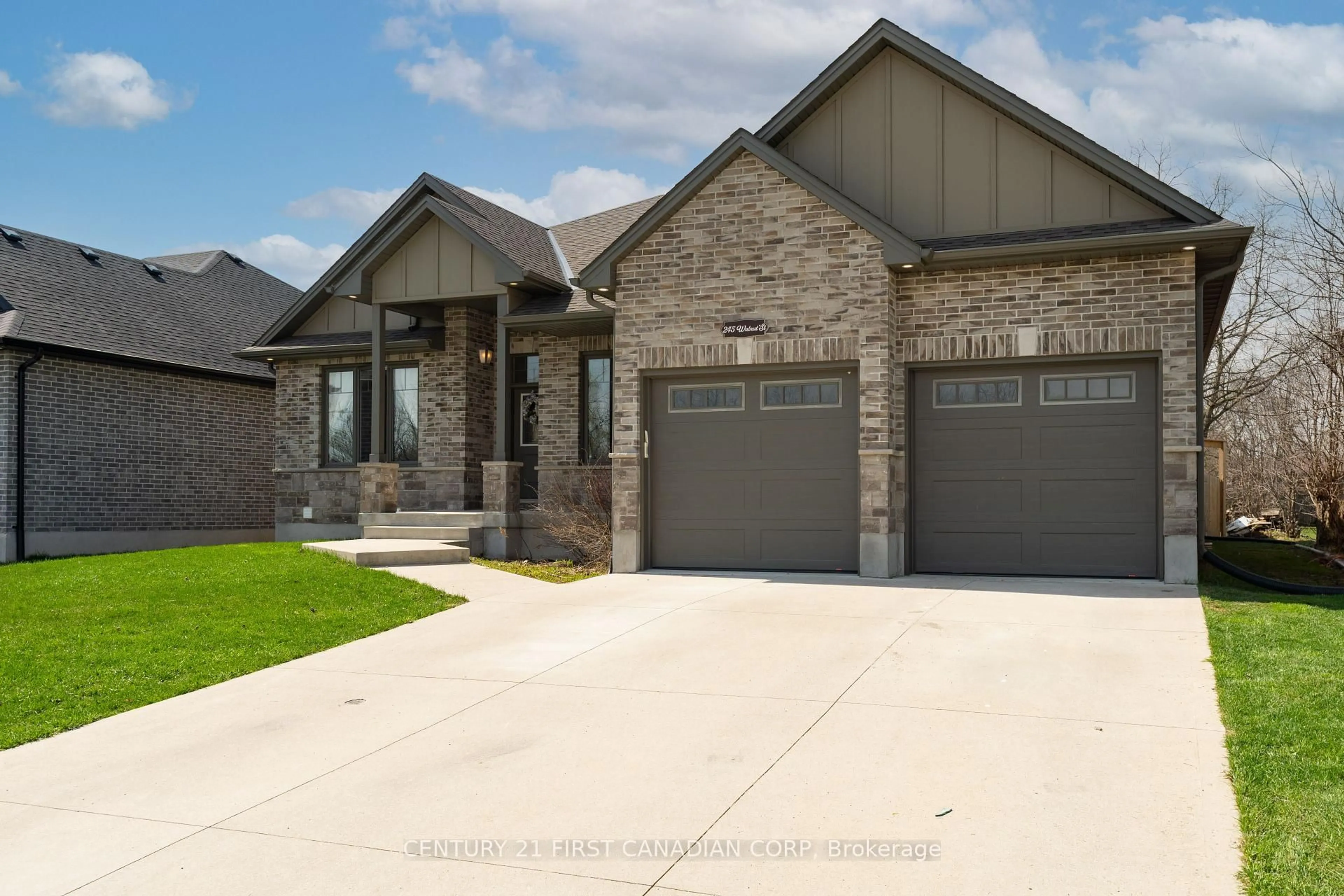 Home with brick exterior material, street for 245 Walnut St, Lucan Biddulph Ontario N0M 2J0