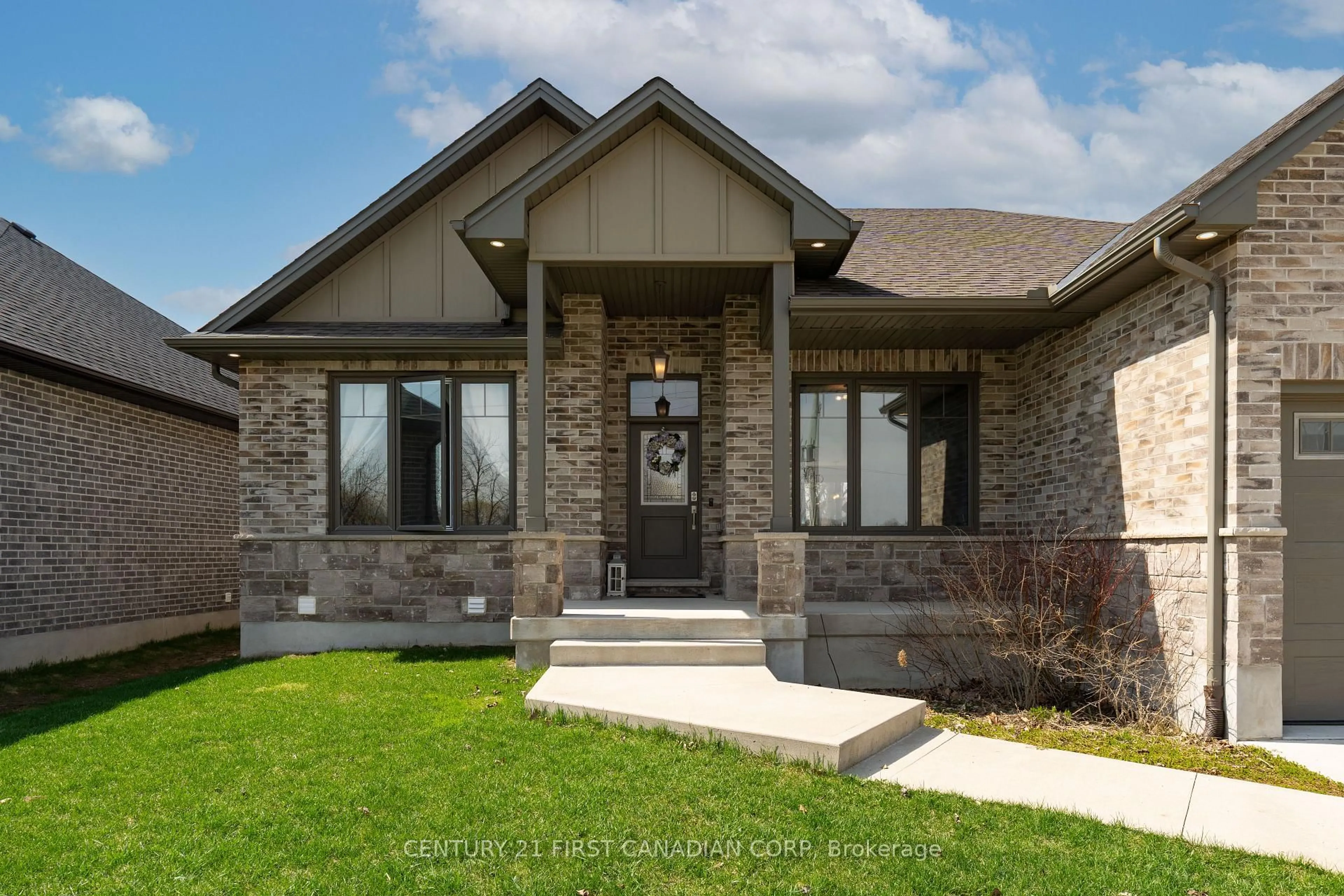 Home with brick exterior material, street for 245 Walnut St, Lucan Biddulph Ontario N0M 2J0