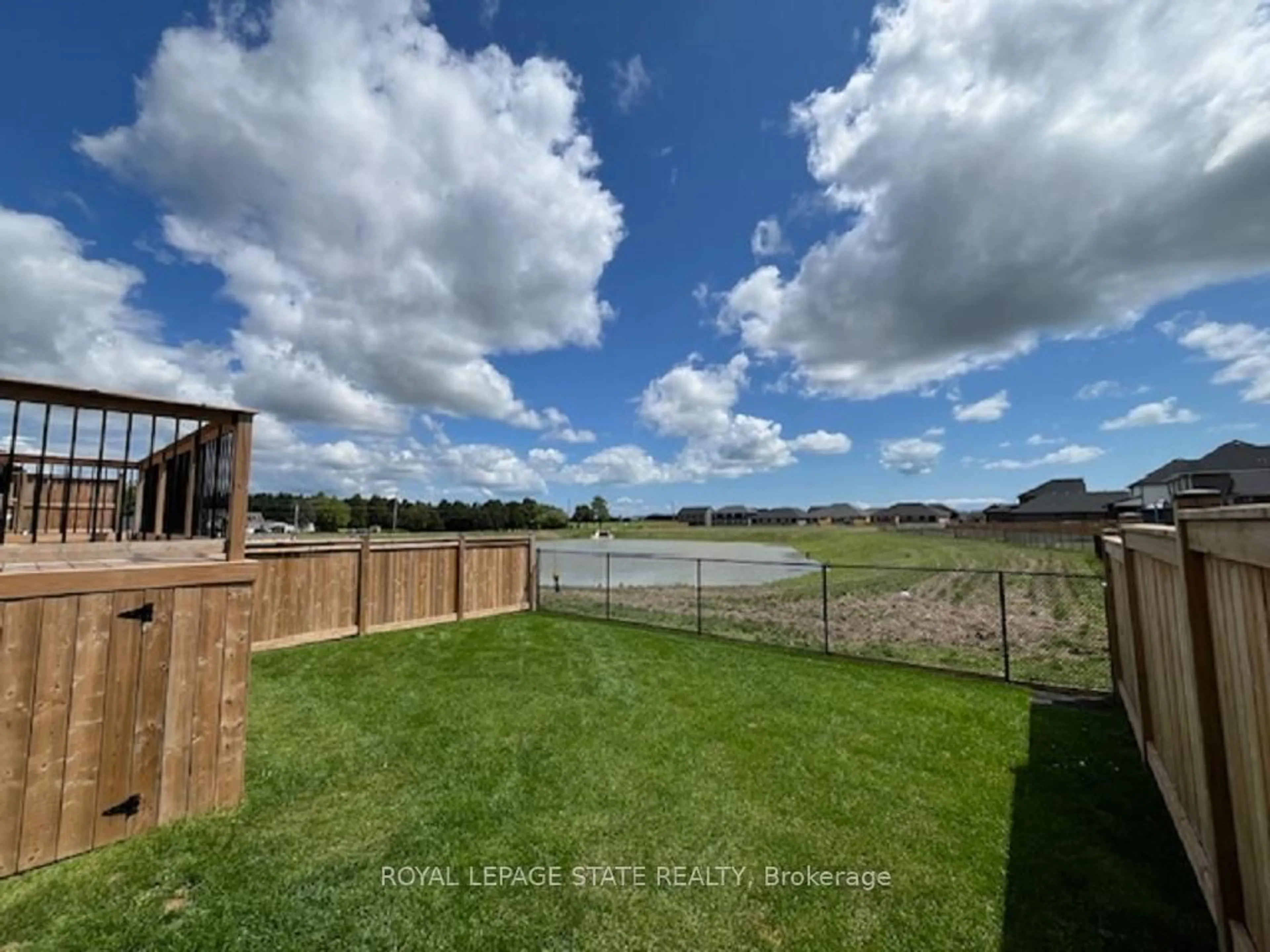 A pic from outside/outdoor area/front of a property/back of a property/a pic from drone, water/lake/river/ocean view for 8 Harlequin Crt, St. Thomas Ontario N5R 0L5
