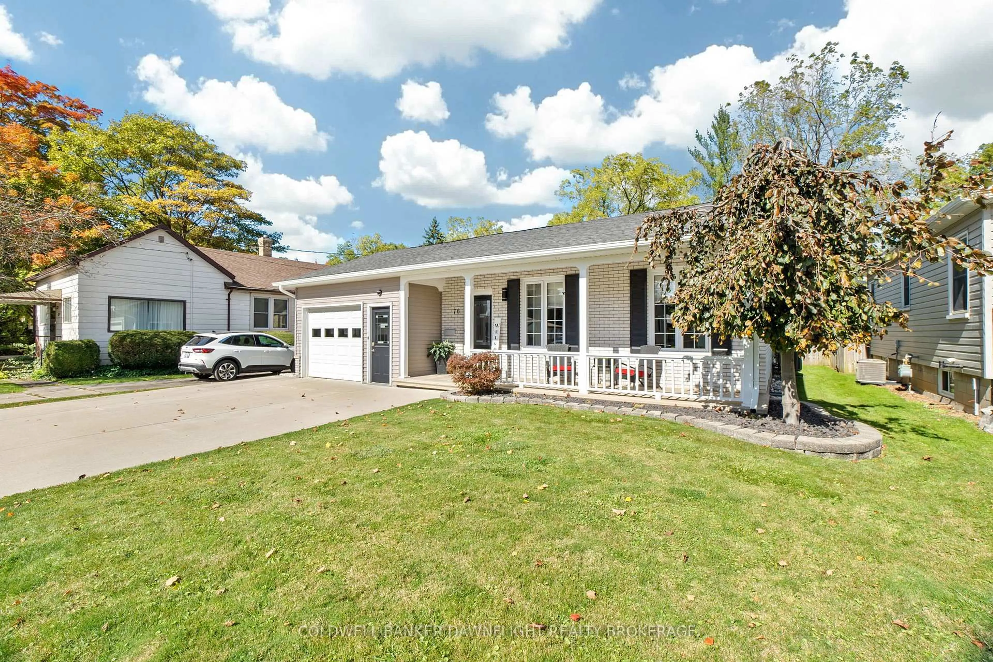Home with vinyl exterior material, street for 76 Sanders St, South Huron Ontario N0M 1S2