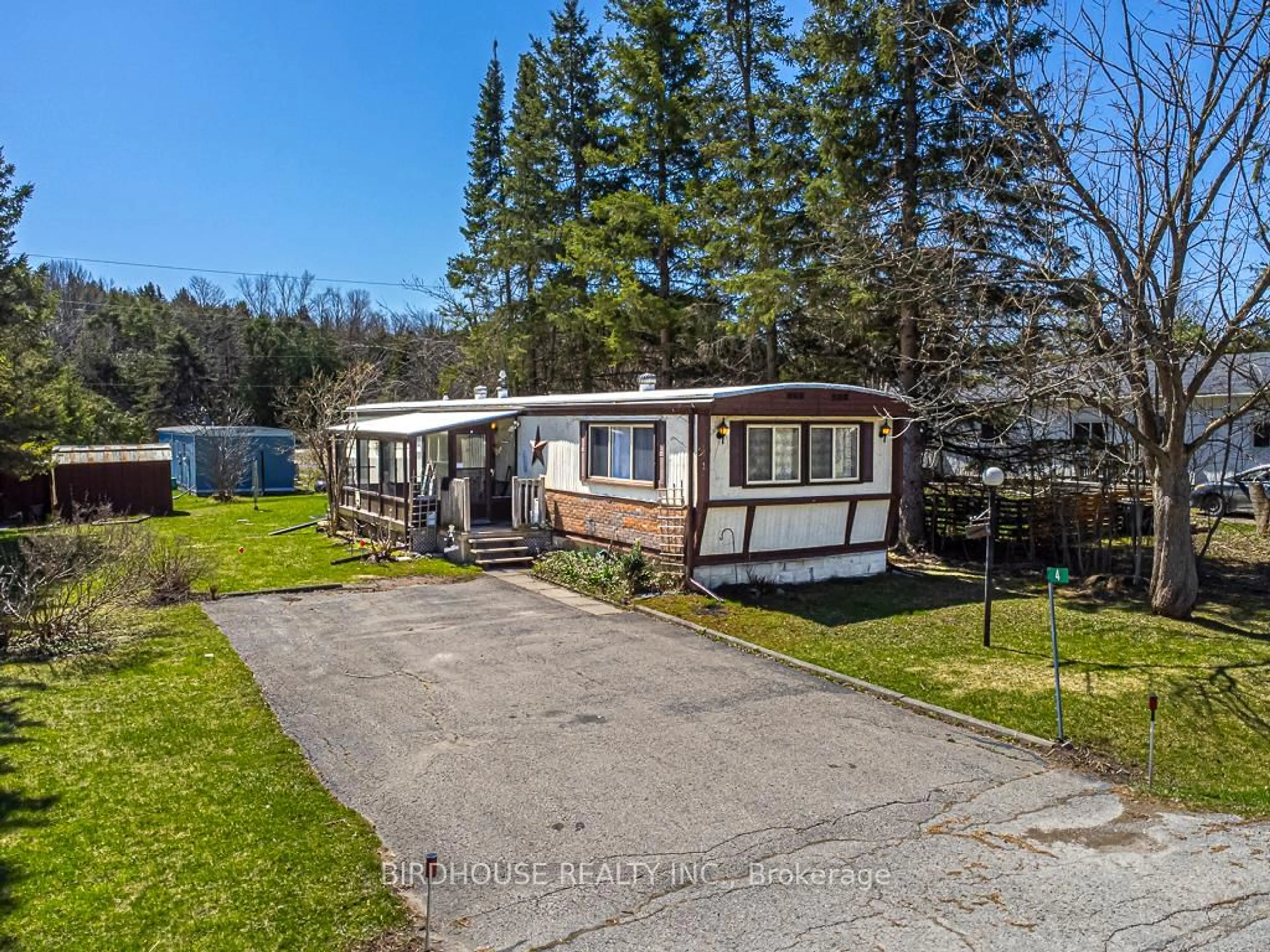 A pic from outside/outdoor area/front of a property/back of a property/a pic from drone, unknown for 4 Park Cres, Kawartha Lakes Ontario K9V 0H5
