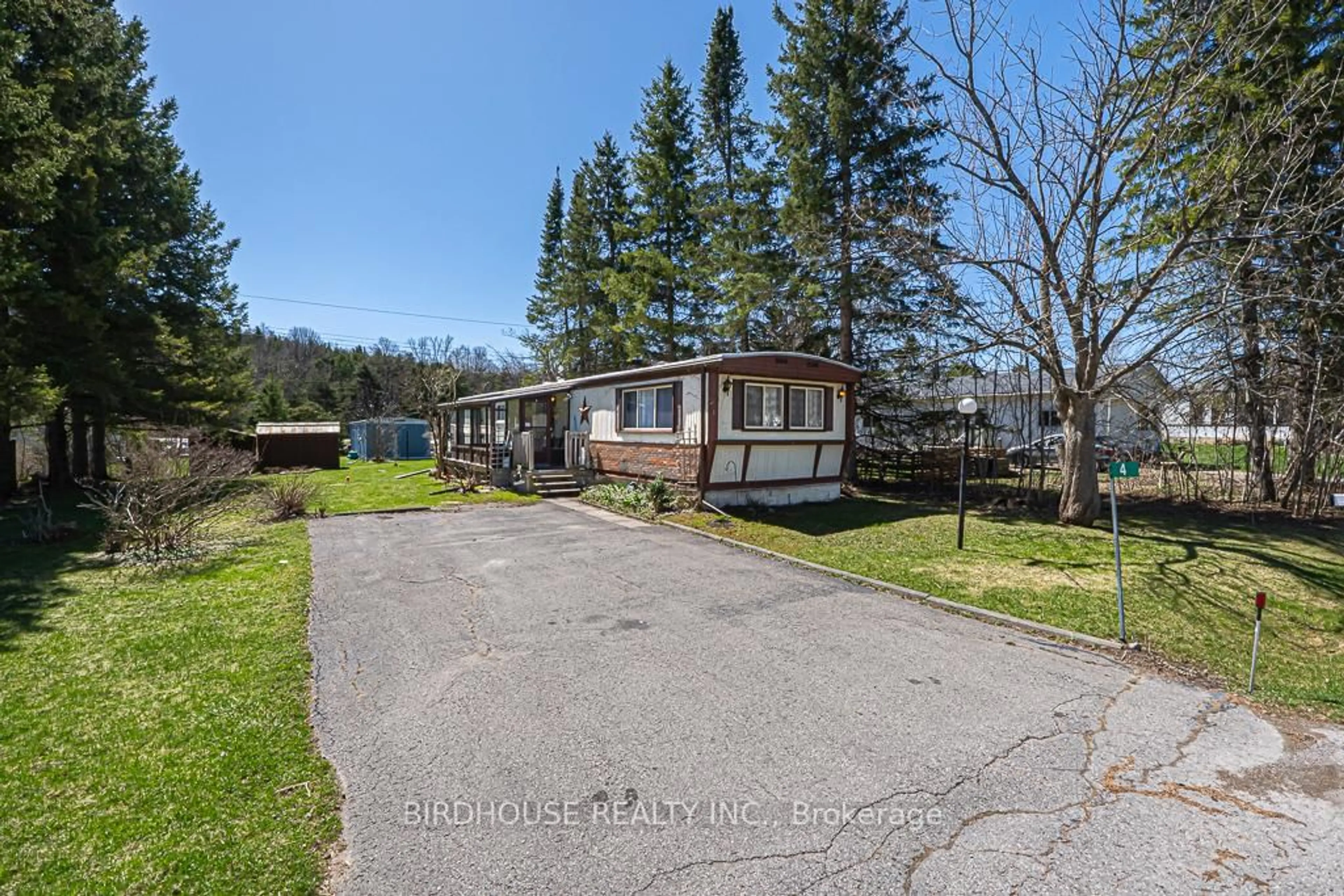 A pic from outside/outdoor area/front of a property/back of a property/a pic from drone, water/lake/river/ocean view for 4 Park Cres, Kawartha Lakes Ontario K9V 0H5