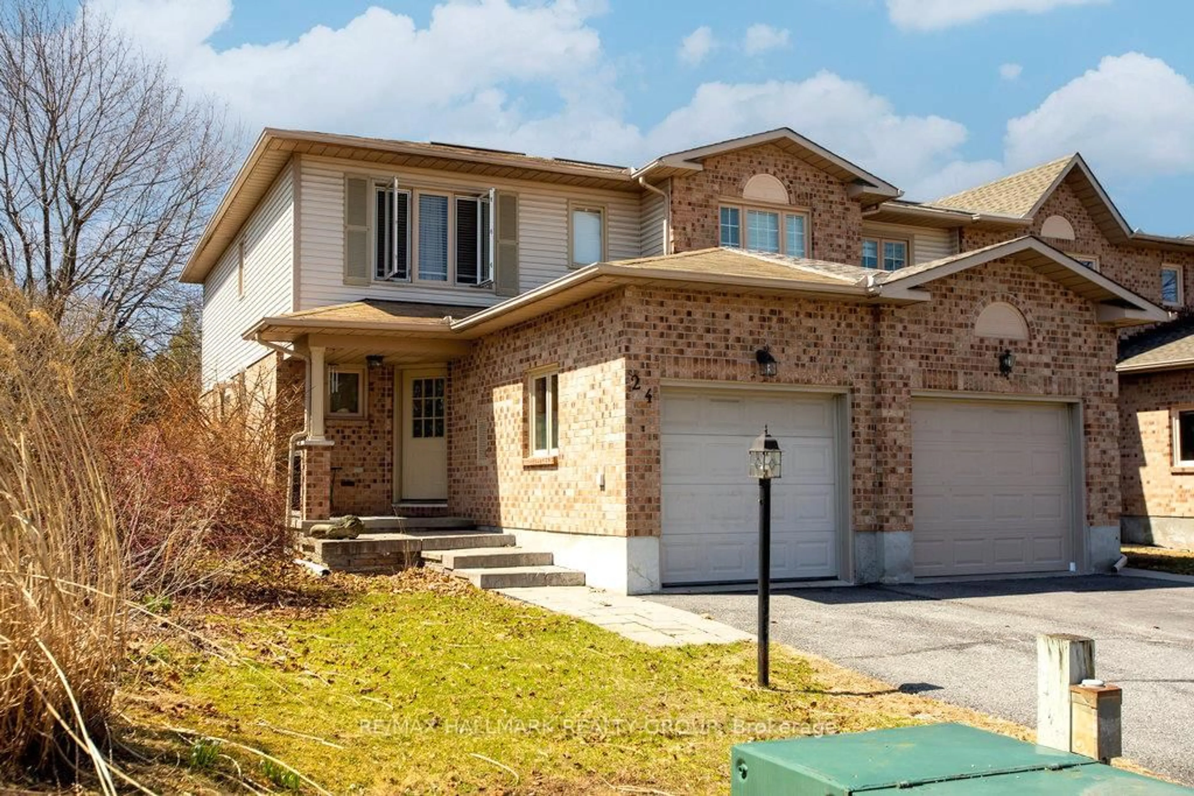 Home with brick exterior material, street for 24 Ravenscroft Crt, Stittsville Ontario K2S 1R3