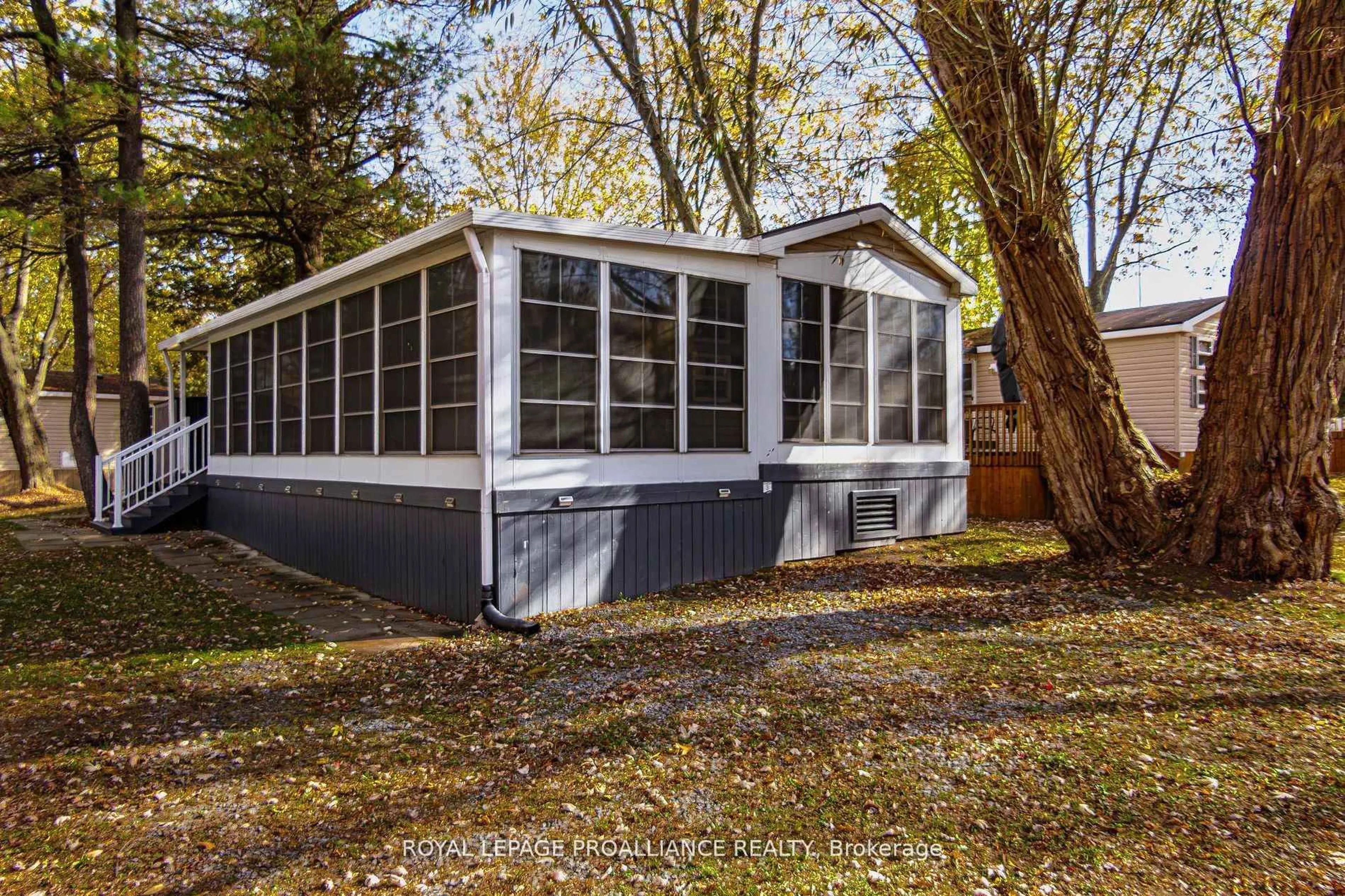 Home with vinyl exterior material, water/lake/river/ocean view for 486 County Rd 18-3 Park Meadow Lane, Prince Edward County Ontario K8V 1P0