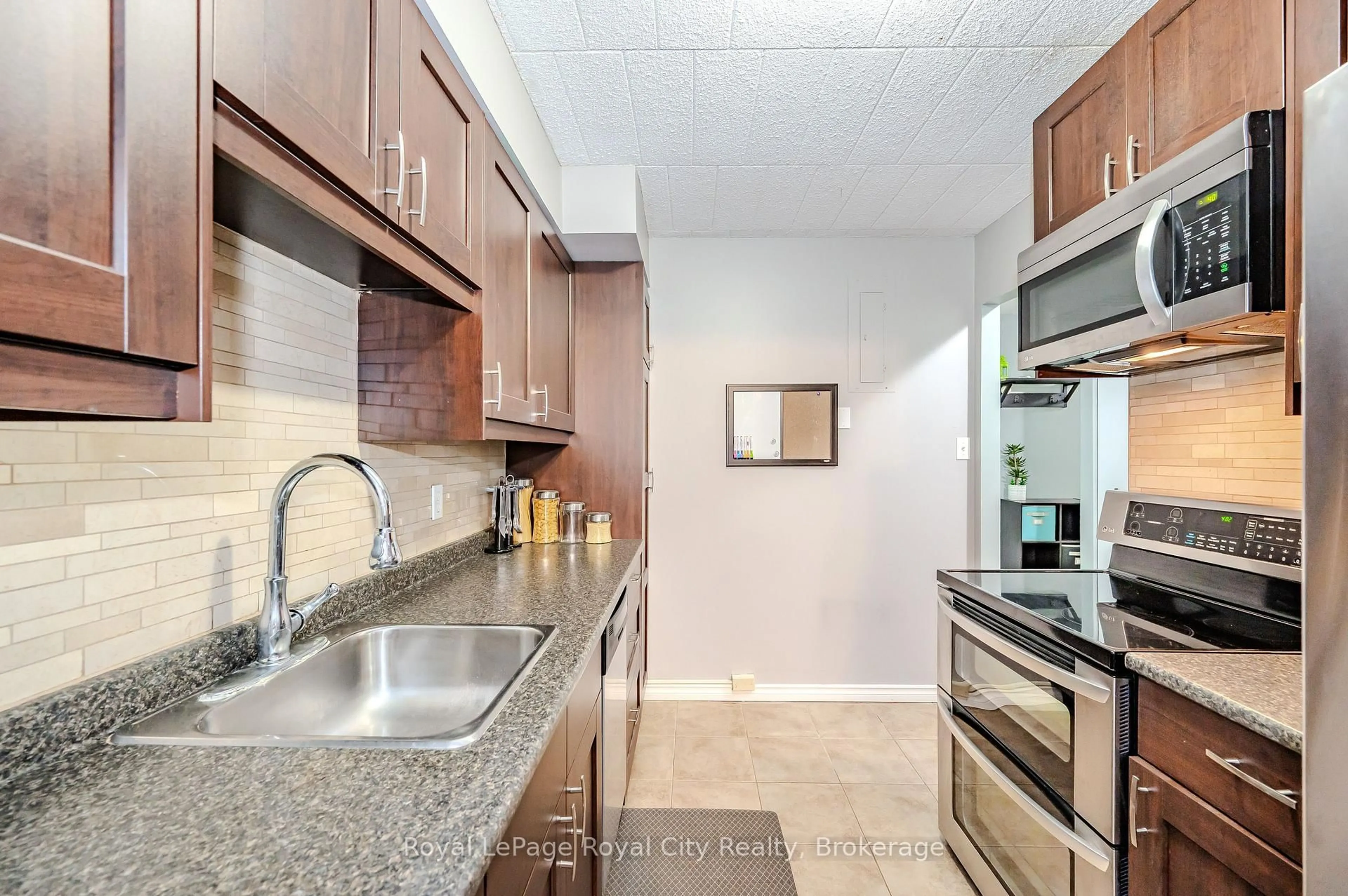 Standard kitchen, ceramic/tile floor for 105 CONROY Cres #511, Guelph Ontario N1G 2V5