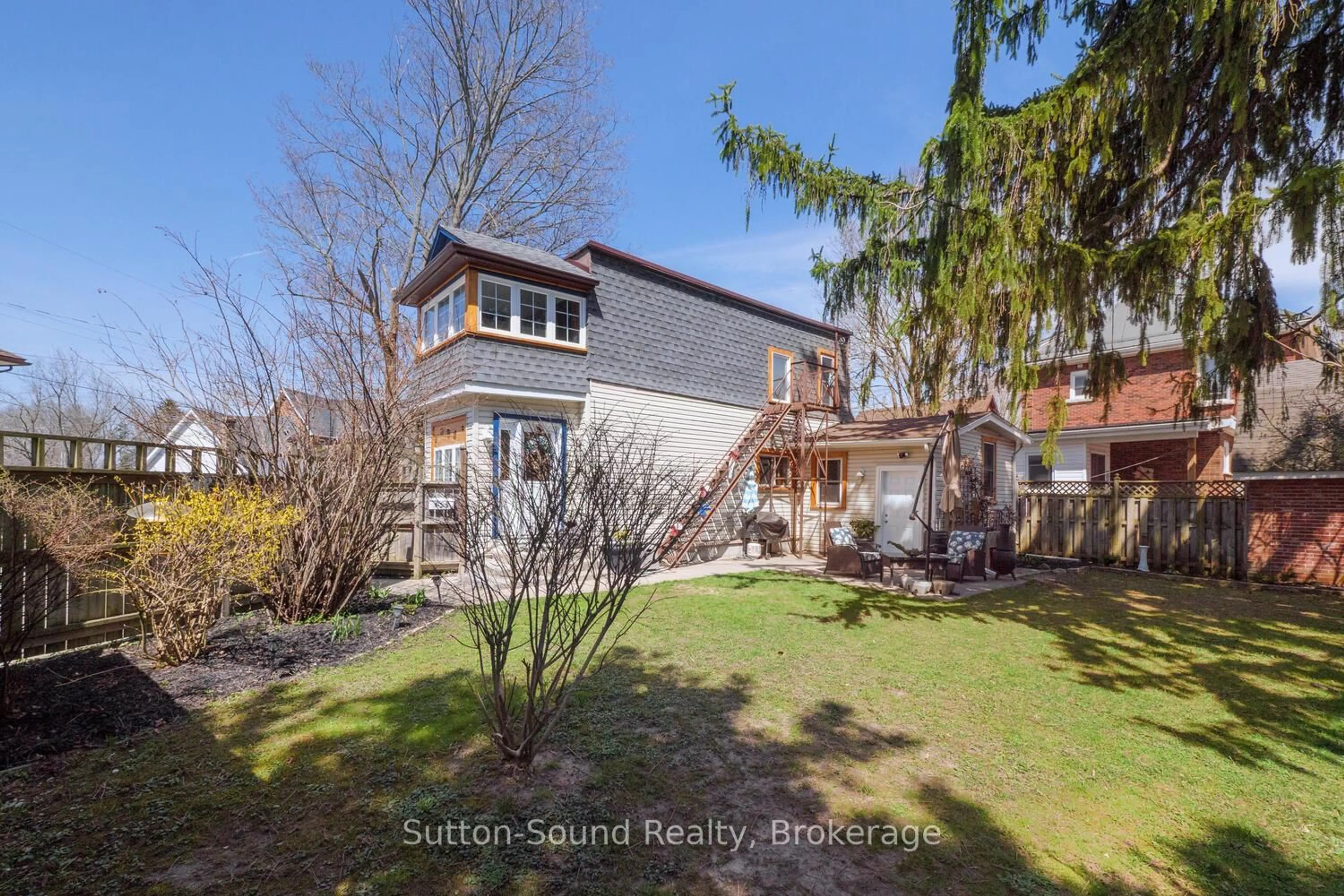 A pic from outside/outdoor area/front of a property/back of a property/a pic from drone, street for 155 5th St. A St, Owen Sound Ontario N4K 1C4