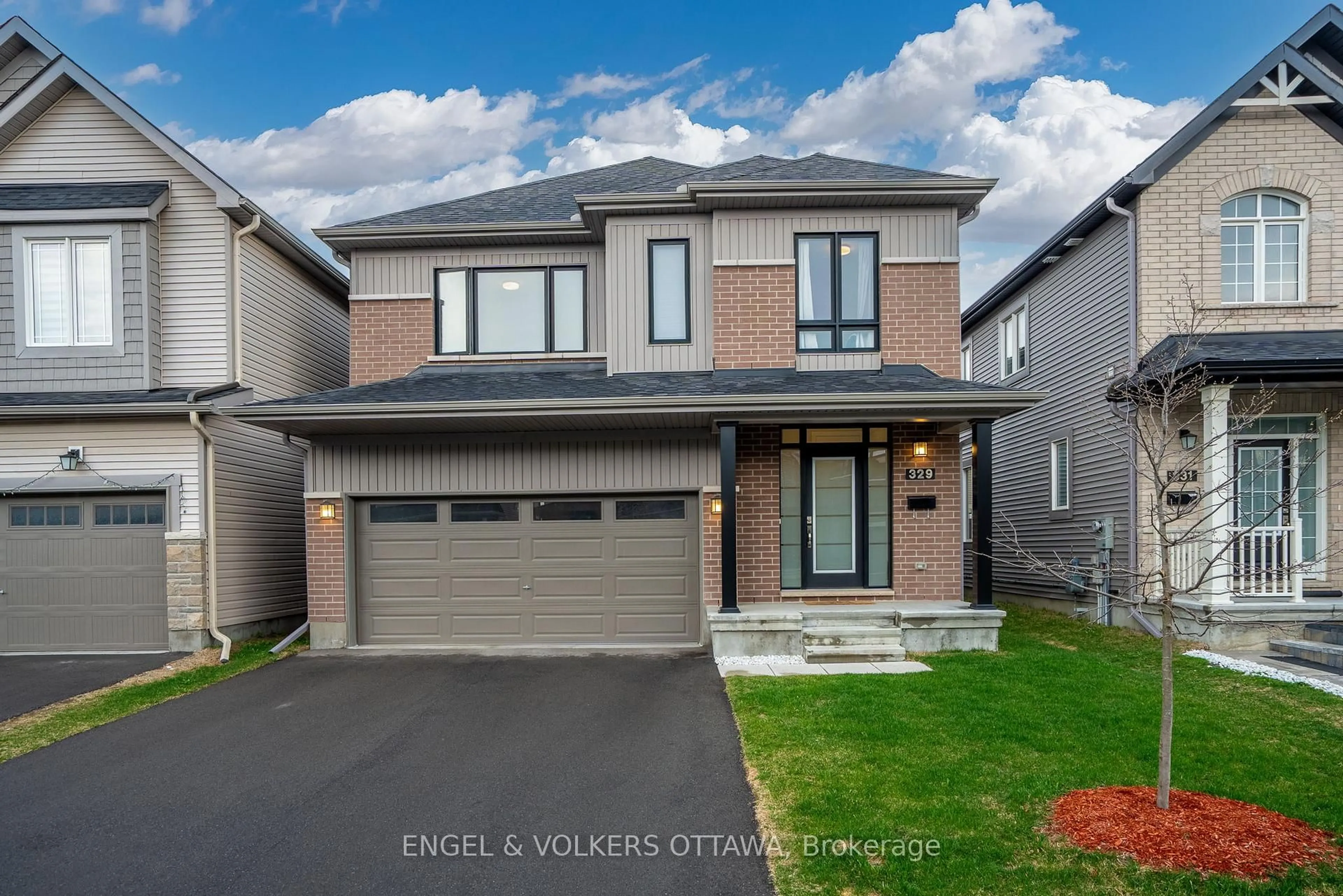 Home with brick exterior material, street for 329 Finial Way, Ottawa Ontario K2J 6V9