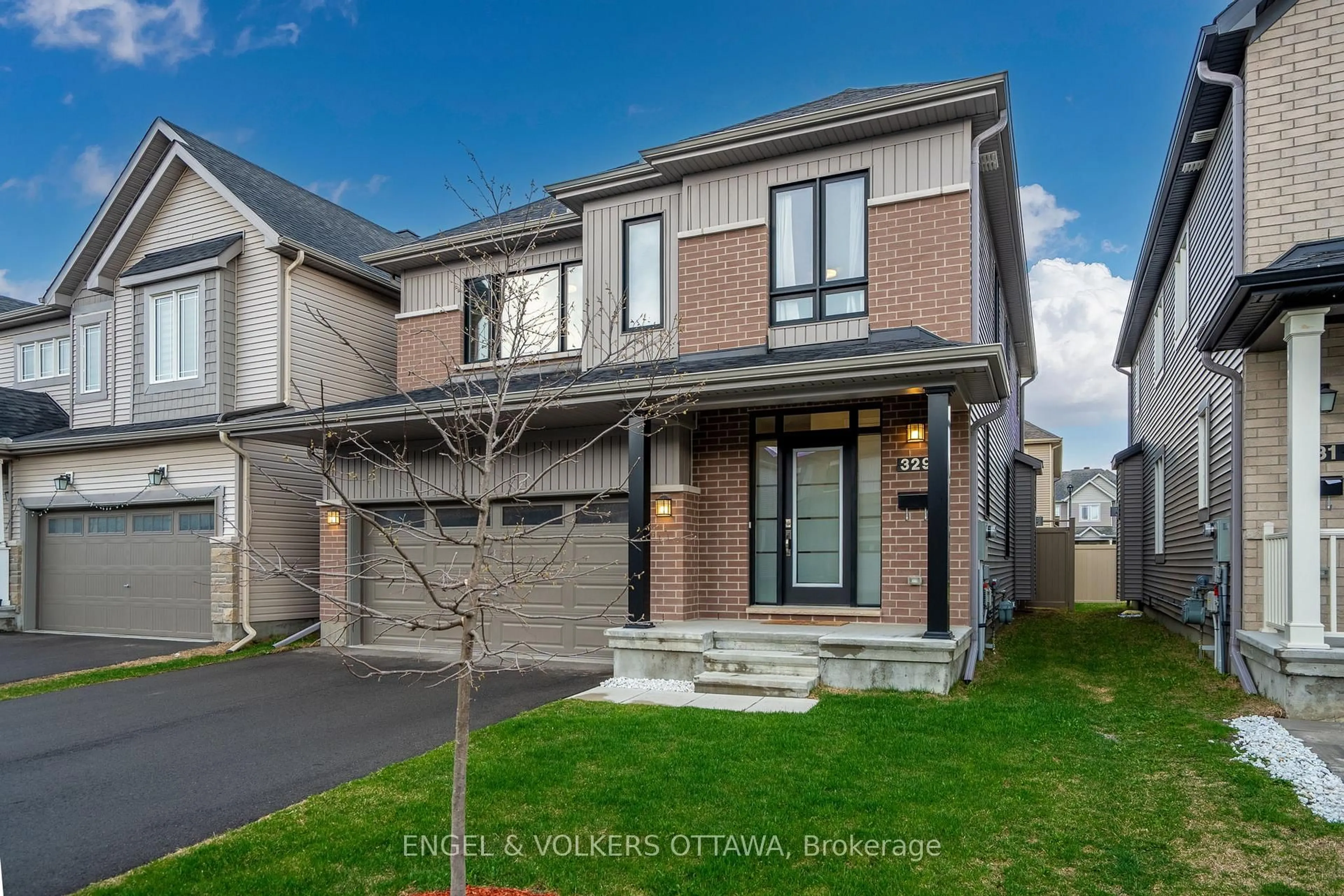 Home with brick exterior material, street for 329 Finial Way, Ottawa Ontario K2J 6V9