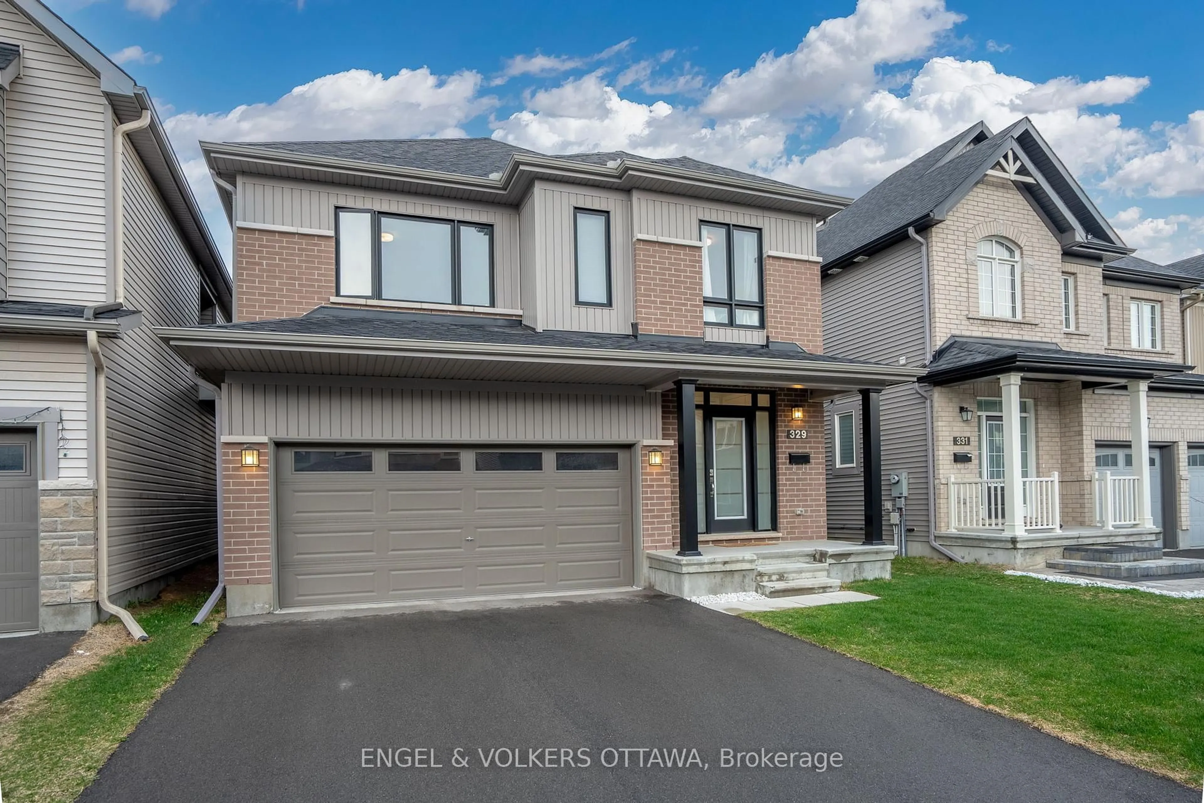 Home with brick exterior material, street for 329 Finial Way, Ottawa Ontario K2J 6V9