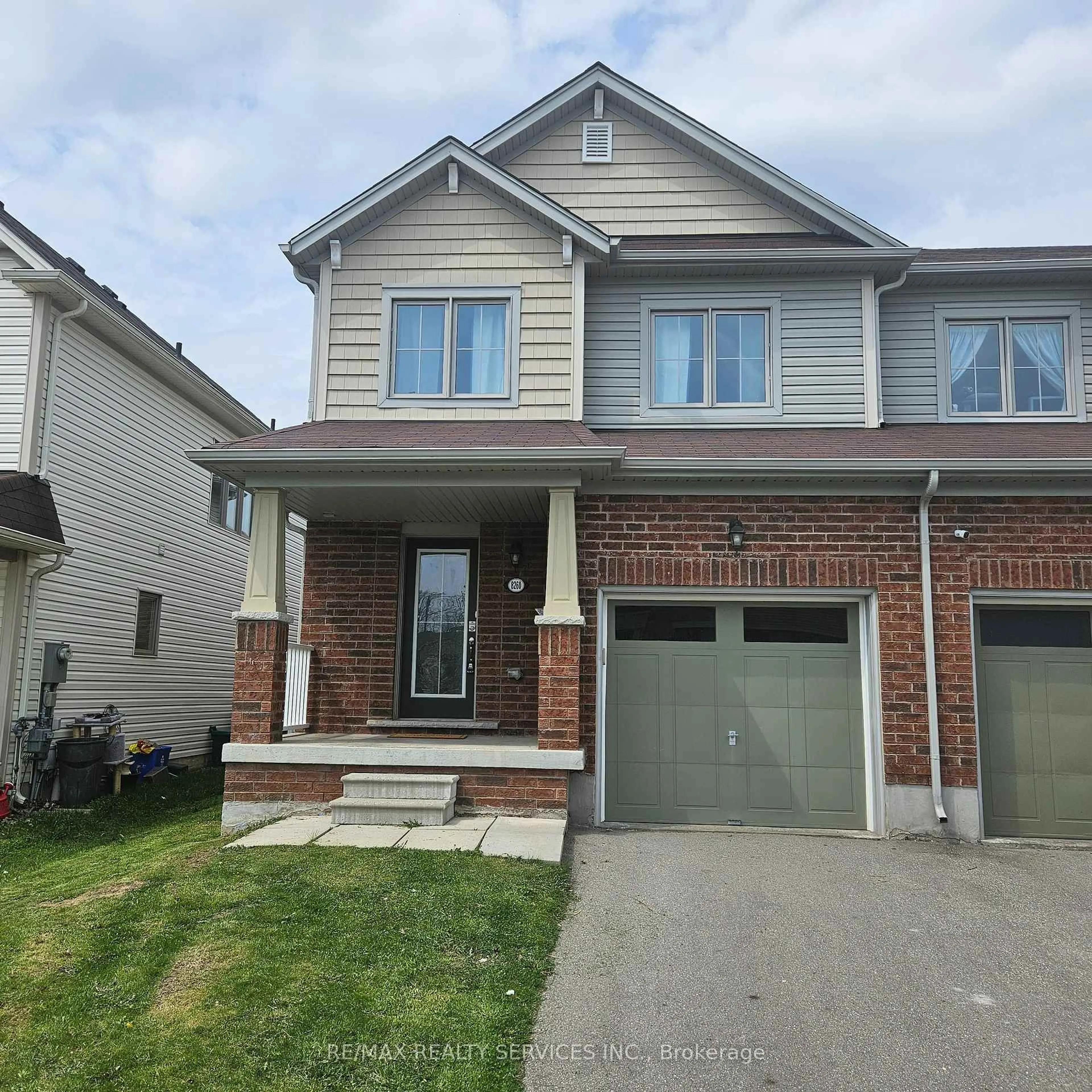 Home with brick exterior material, street for 8260 Tulip Tree Dr, Niagara Falls Ontario L2N 0H4