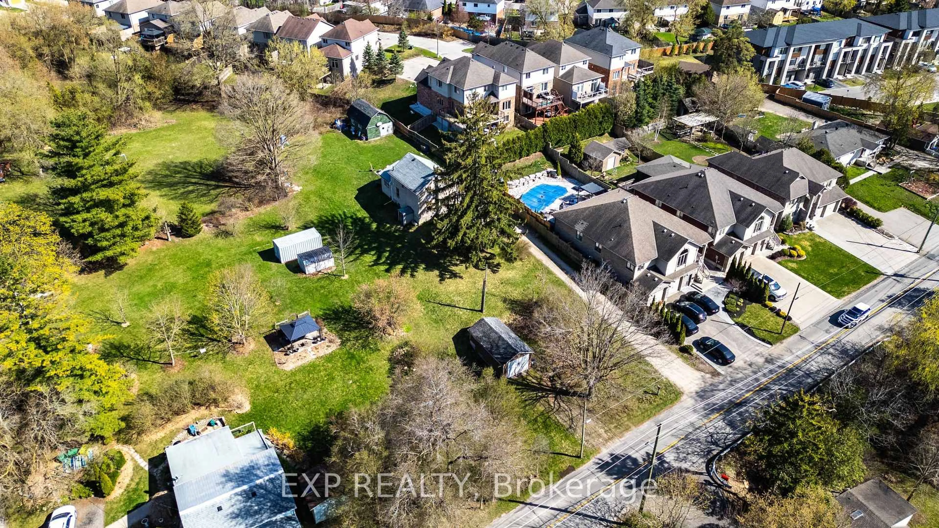 A pic from outside/outdoor area/front of a property/back of a property/a pic from drone, street for 394 River Rd, Cambridge Ontario N3C 2B7