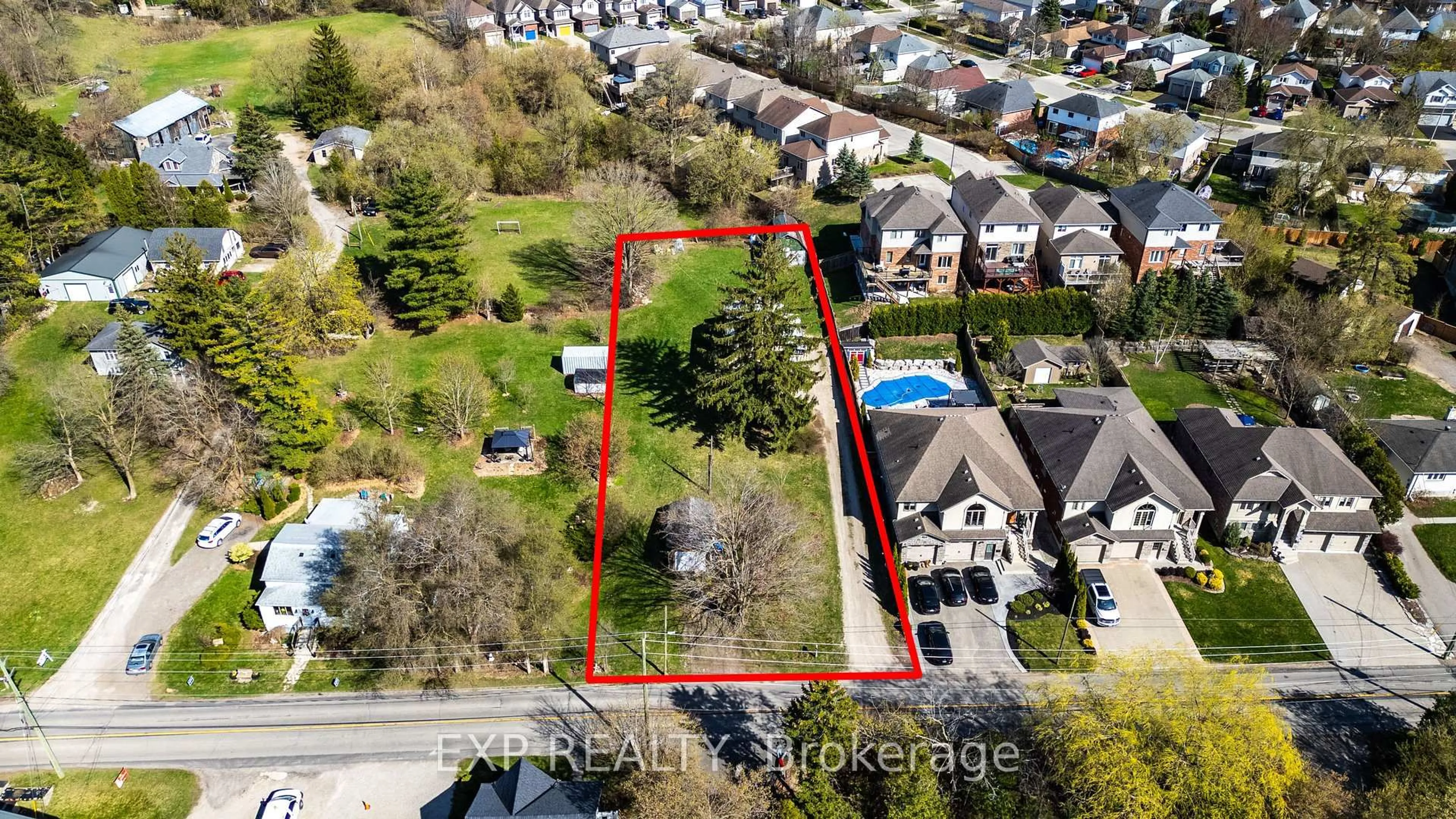 A pic from outside/outdoor area/front of a property/back of a property/a pic from drone, street for 394 River Rd, Cambridge Ontario N3C 2B7