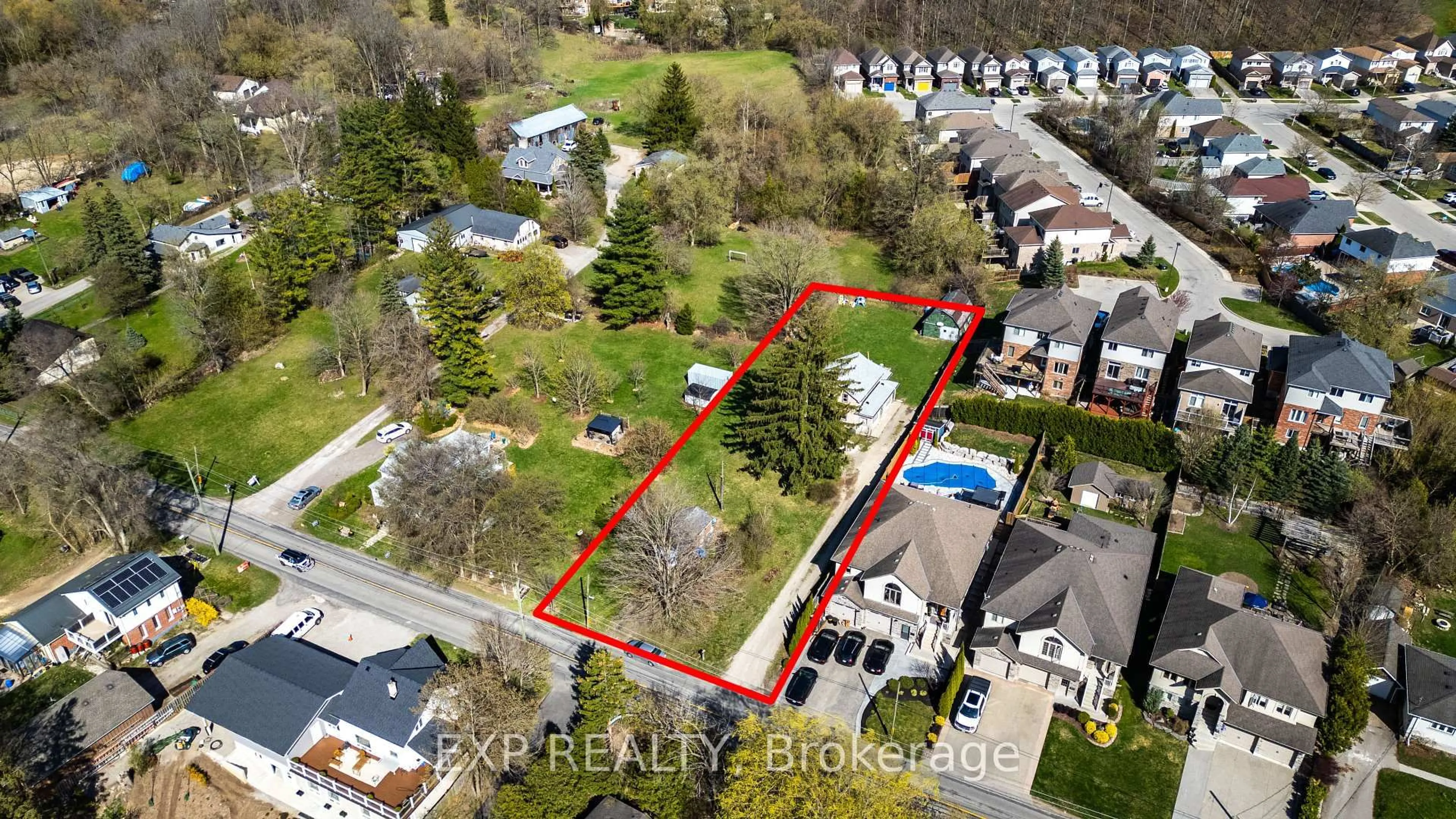 A pic from outside/outdoor area/front of a property/back of a property/a pic from drone, street for 394 River Rd, Cambridge Ontario N3C 2B7