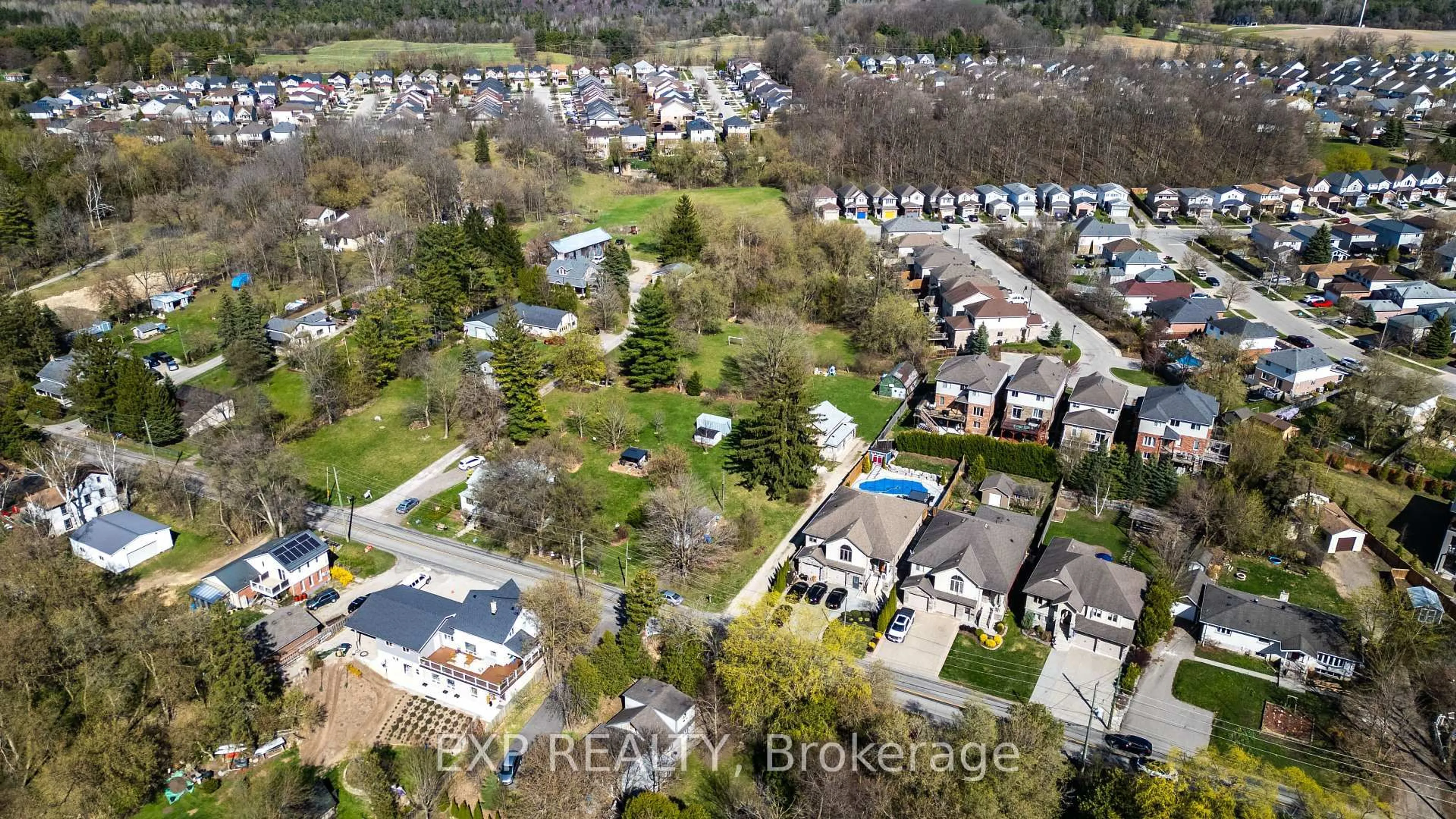 A pic from outside/outdoor area/front of a property/back of a property/a pic from drone, street for 394 River Rd, Cambridge Ontario N3C 2B7