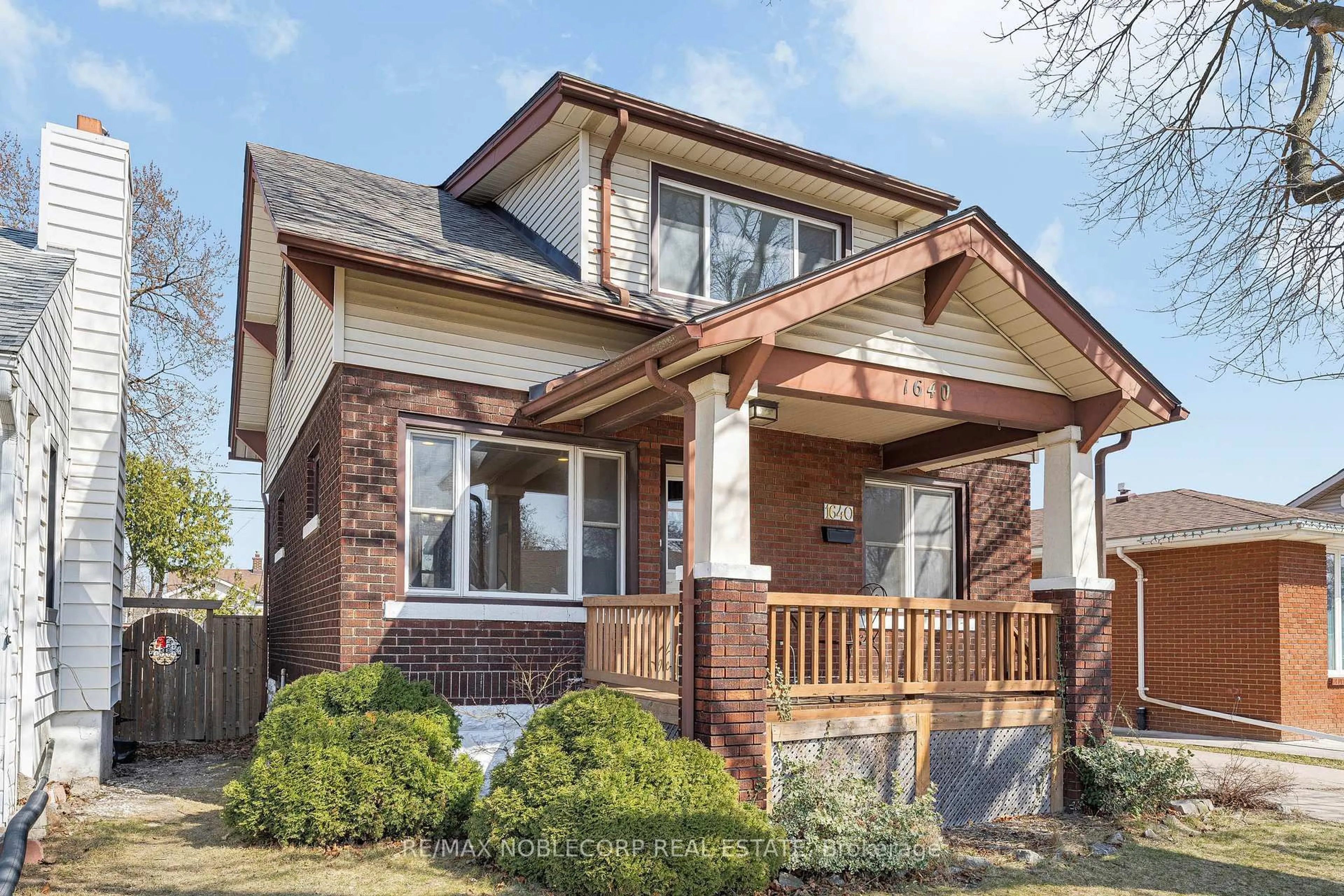 Home with brick exterior material, street for 1640 Pillette Rd, Windsor Ontario N8Y 3C5