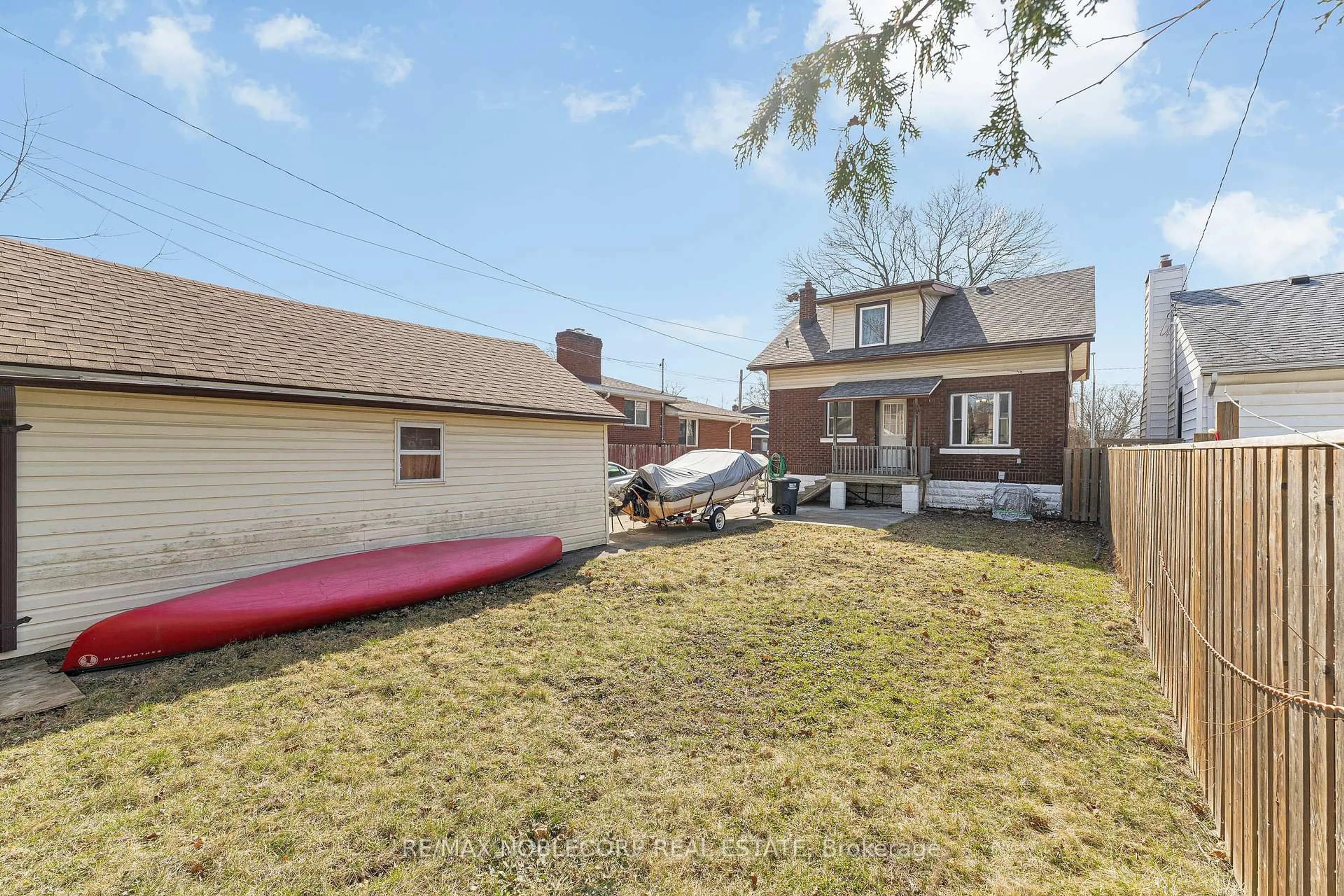 A pic from outside/outdoor area/front of a property/back of a property/a pic from drone, street for 1640 Pillette Rd, Windsor Ontario N8Y 3C5