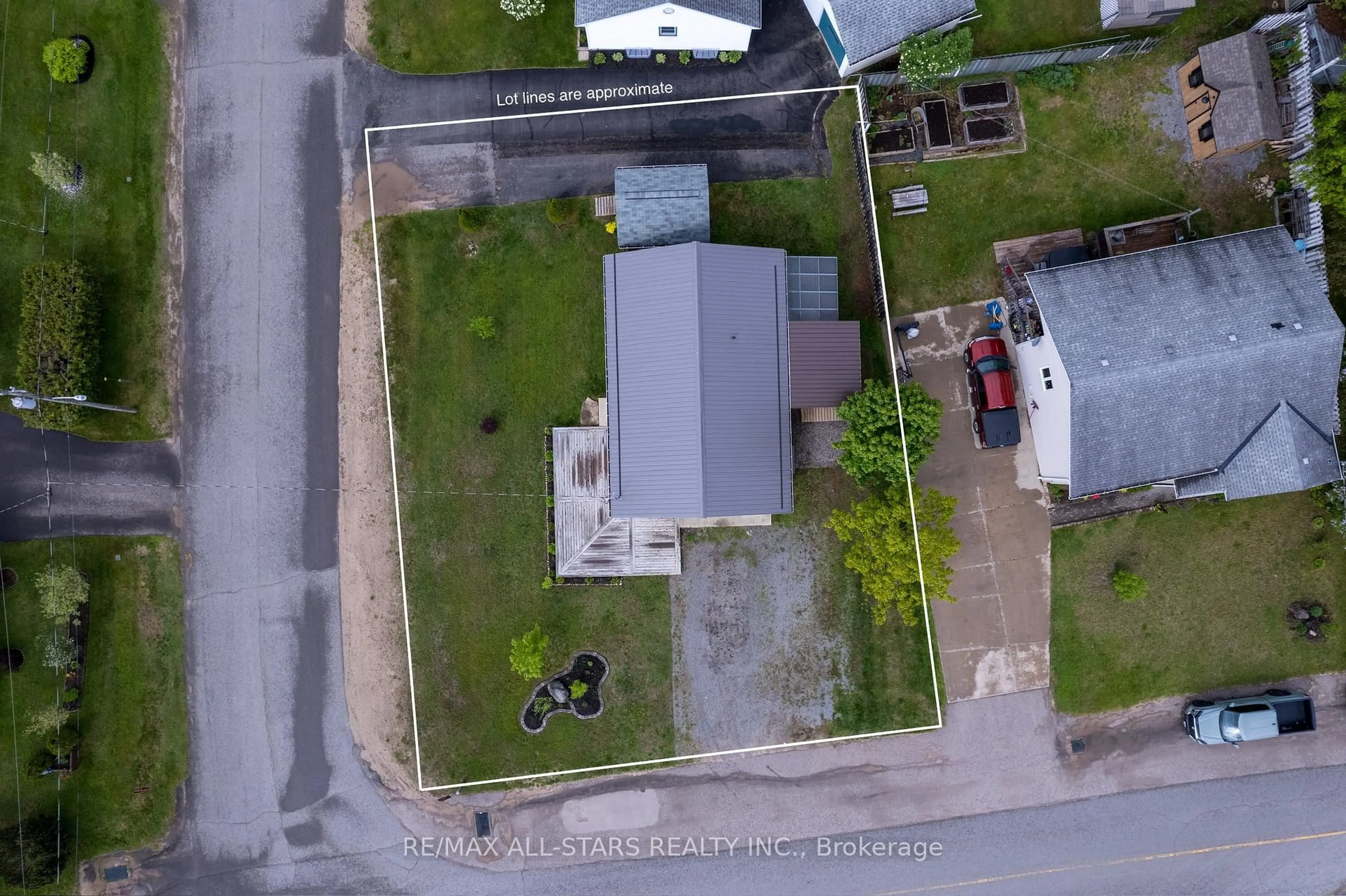A pic from outside/outdoor area/front of a property/back of a property/a pic from drone, street for 132 Newkirk Blvd, Burnt River Ontario K0M 1C0