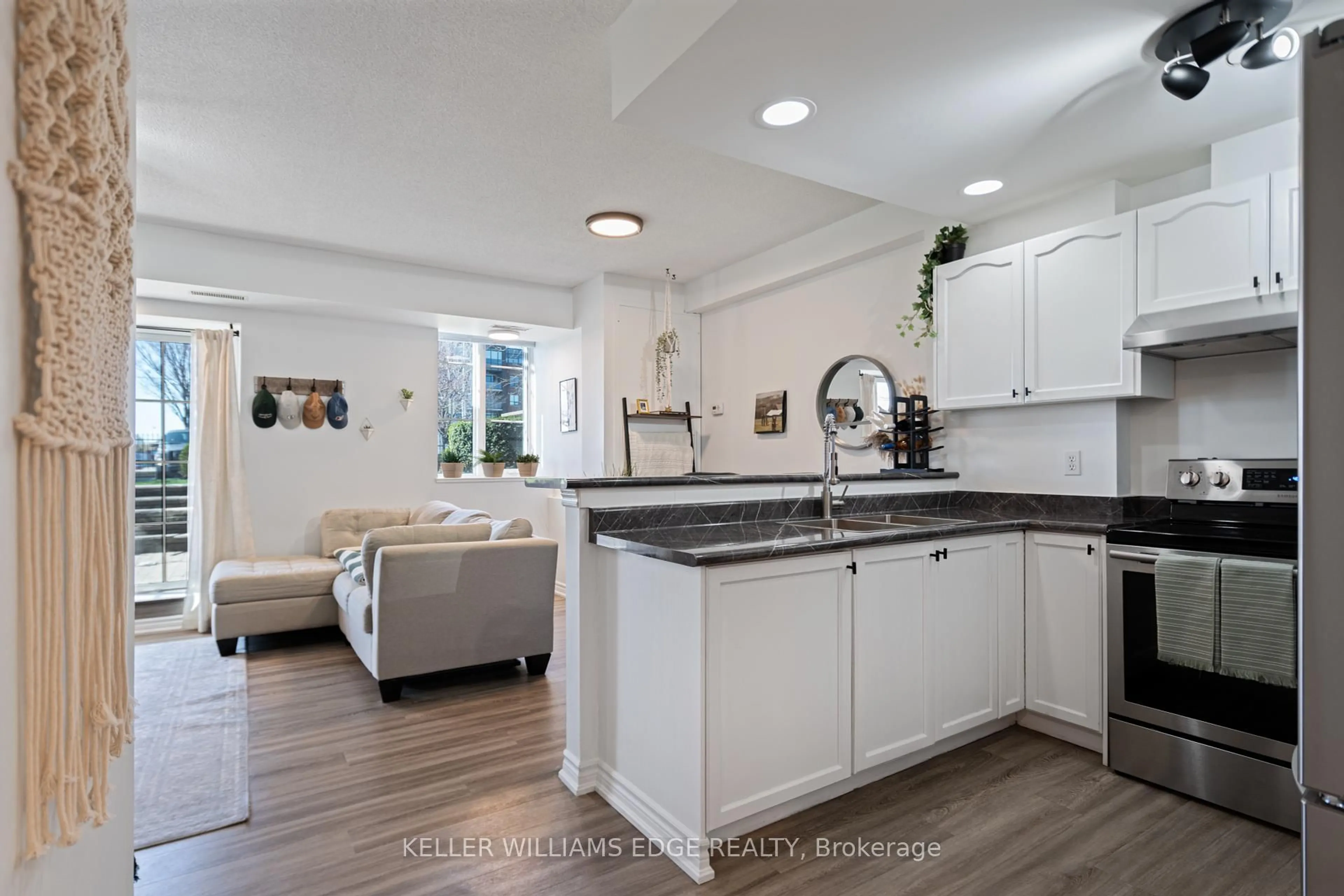 Open concept kitchen, ceramic/tile floor for 262 Dundas St #106, Hamilton Ontario L8B 1A9