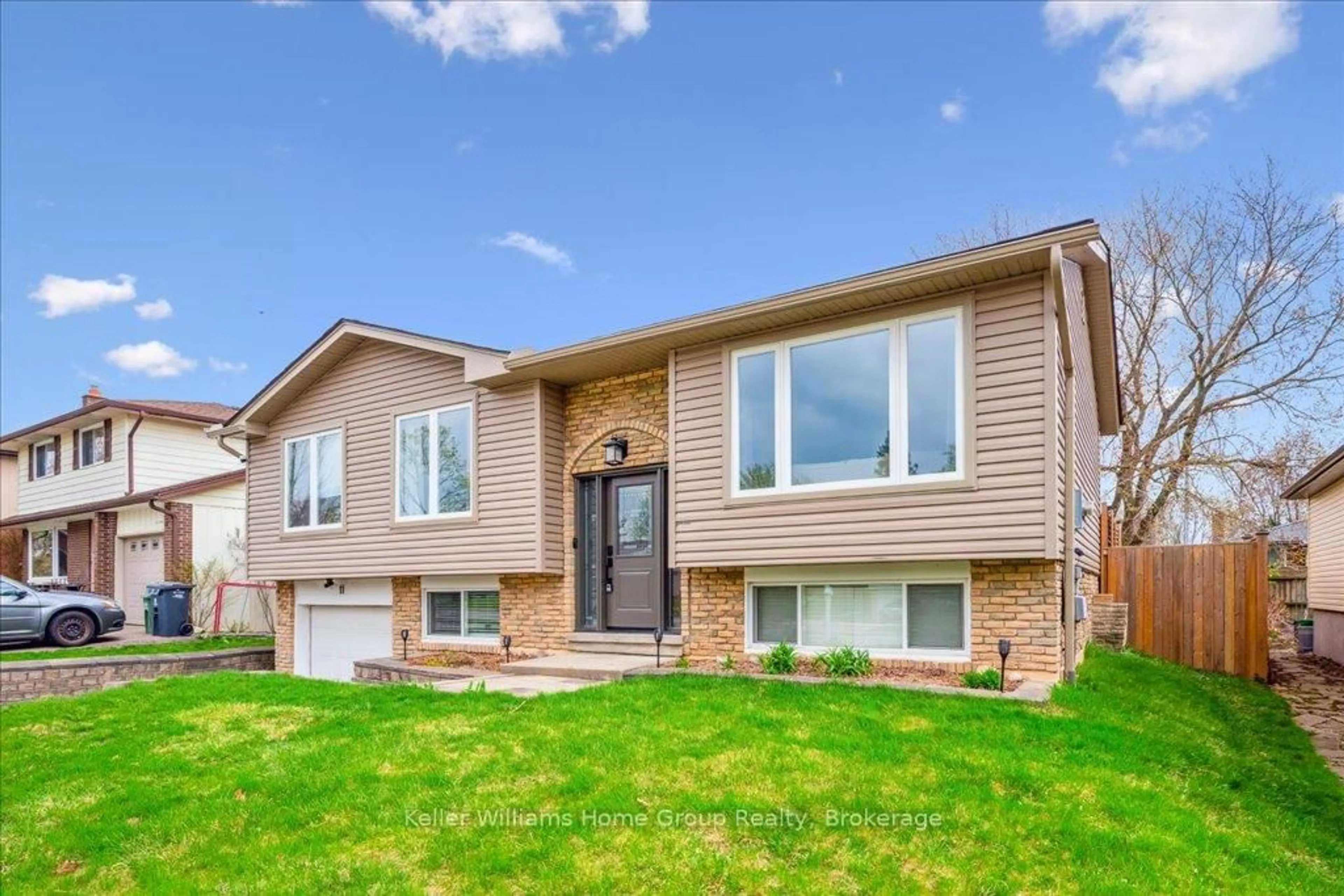 Home with brick exterior material, street for 11 Fairmeadow Dr, Guelph Ontario N1H 6X2