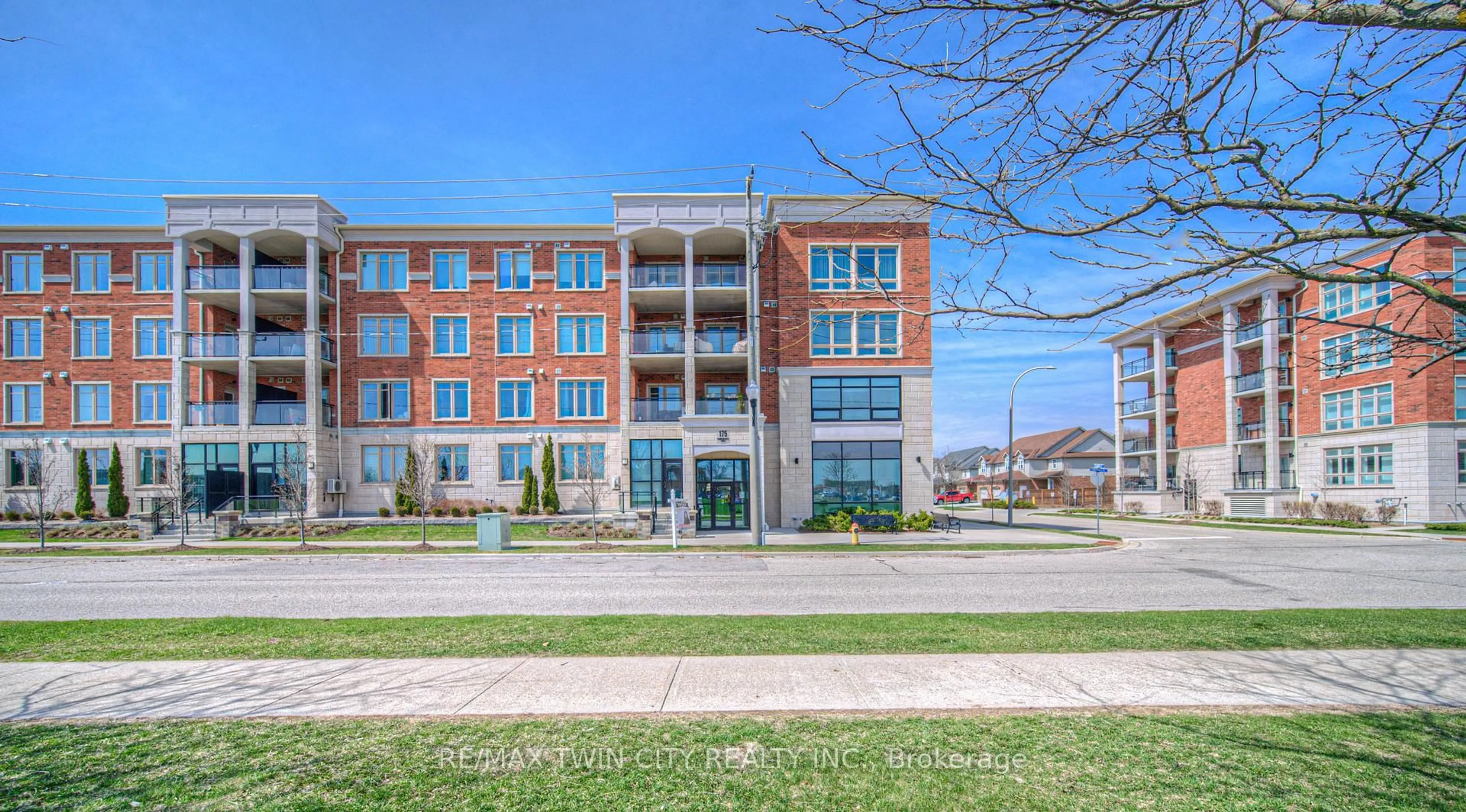 Home with brick exterior material, building for 175 Commonwealth St #406, Kitchener Ontario N2E 0H4