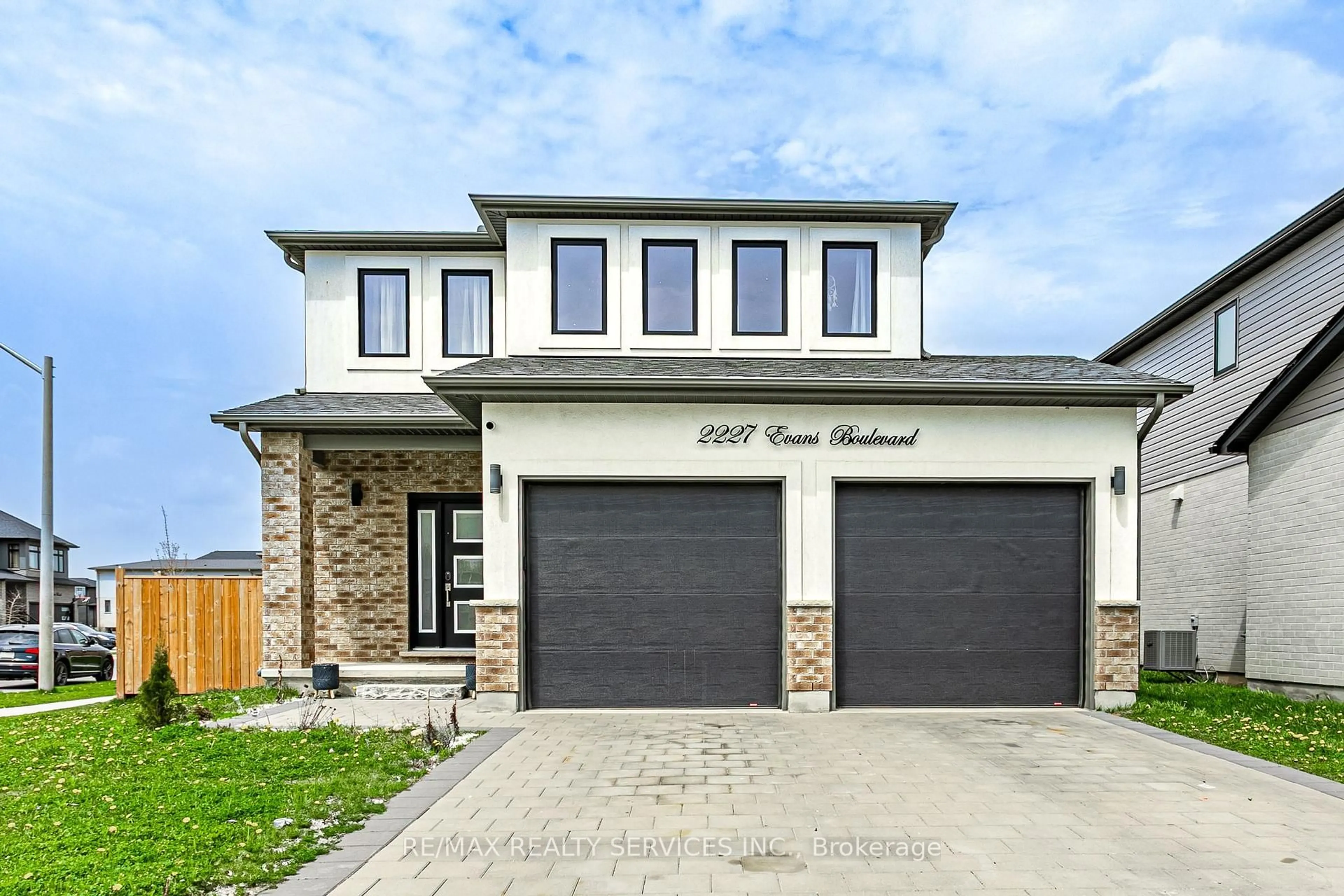 Home with brick exterior material, street for 2227 Evans Blvd, London South Ontario N6M 0H7