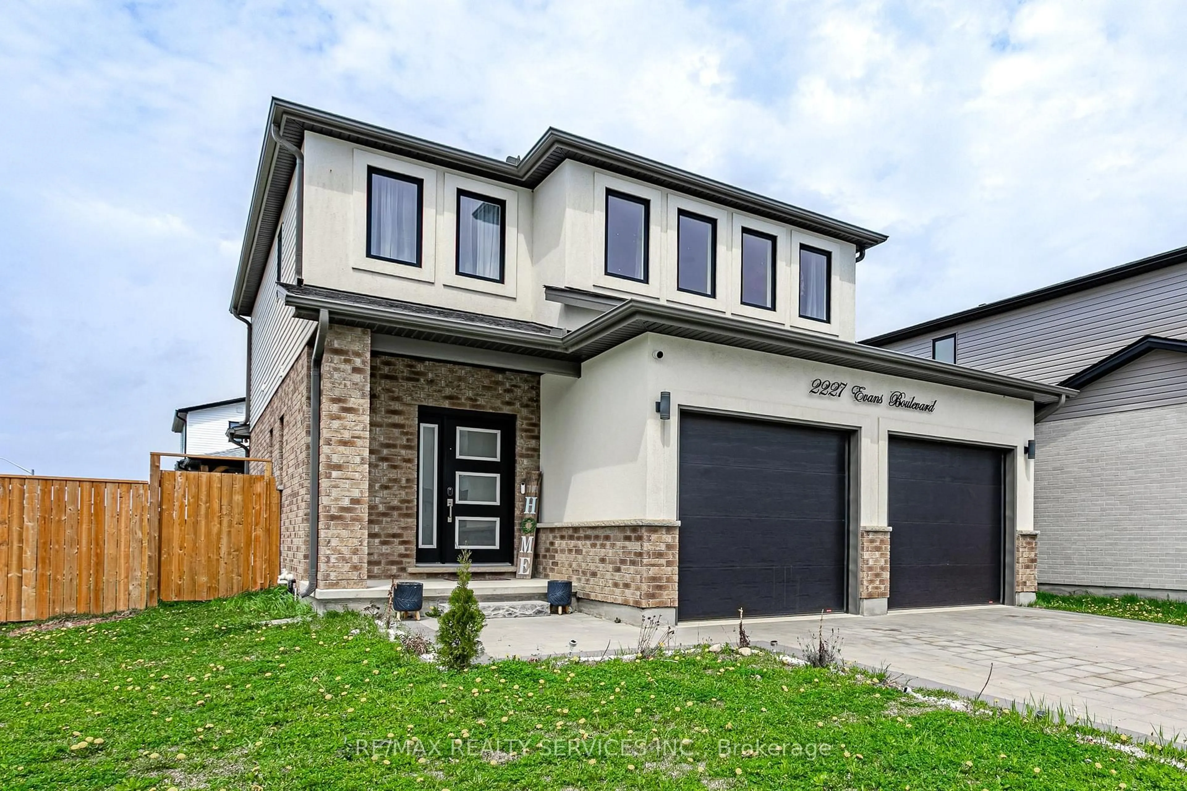 Home with brick exterior material, street for 2227 Evans Blvd, London South Ontario N6M 0H7