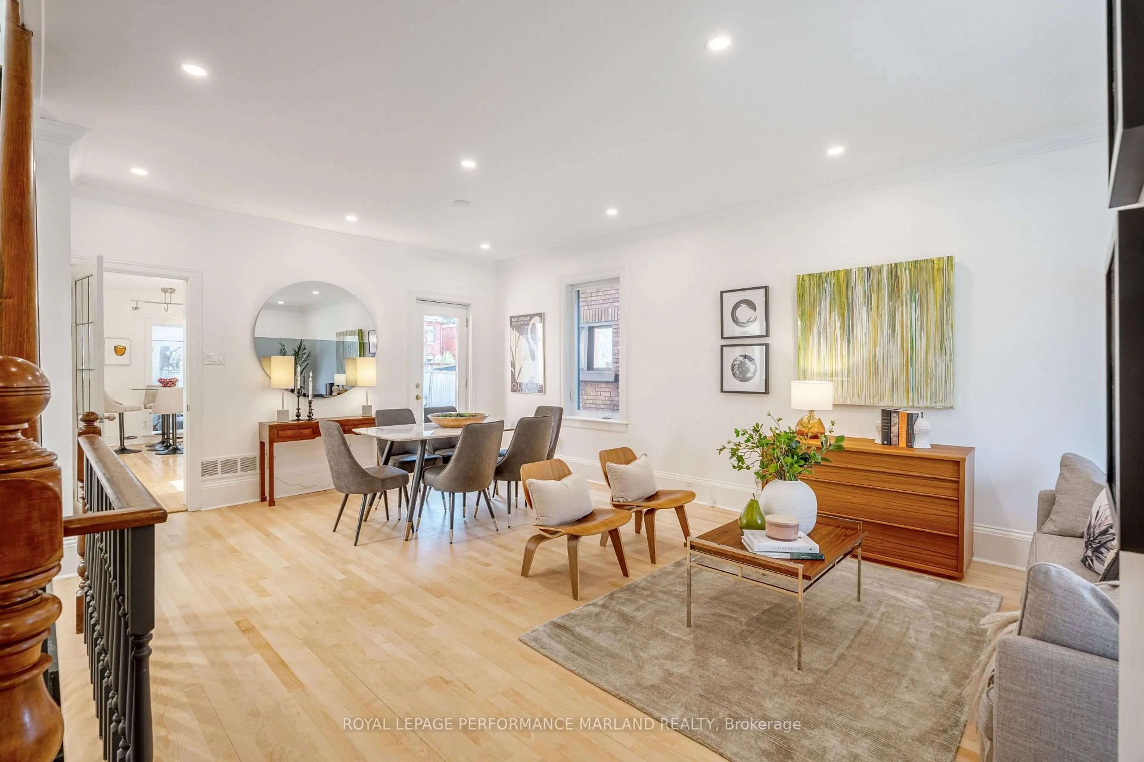 Living room with furniture, wood/laminate floor for 36 Fourth Ave, Ottawa Ontario K1S 2L2