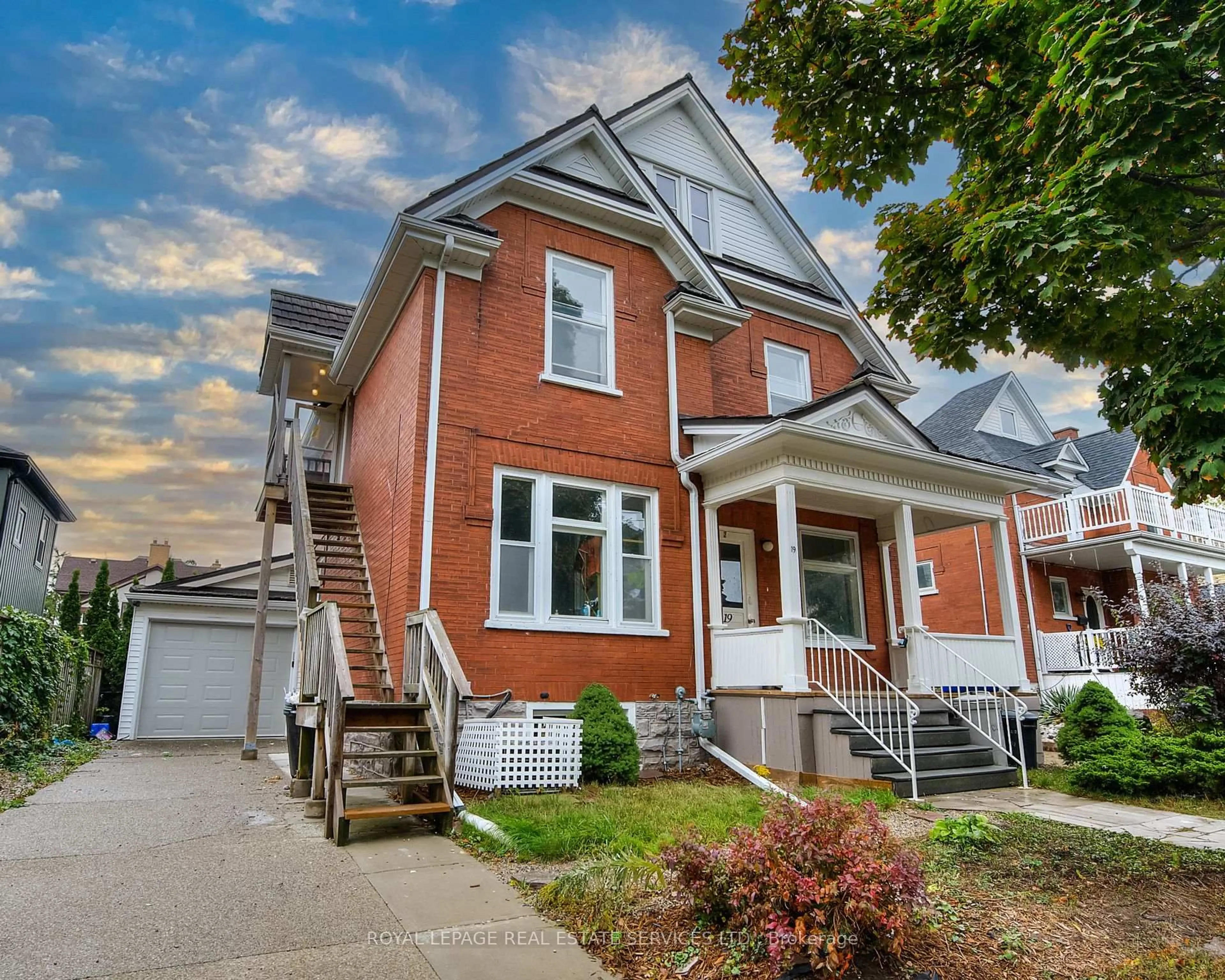Home with brick exterior material, street for 19 Clarence Pl, Kitchener Ontario N2H 2L1