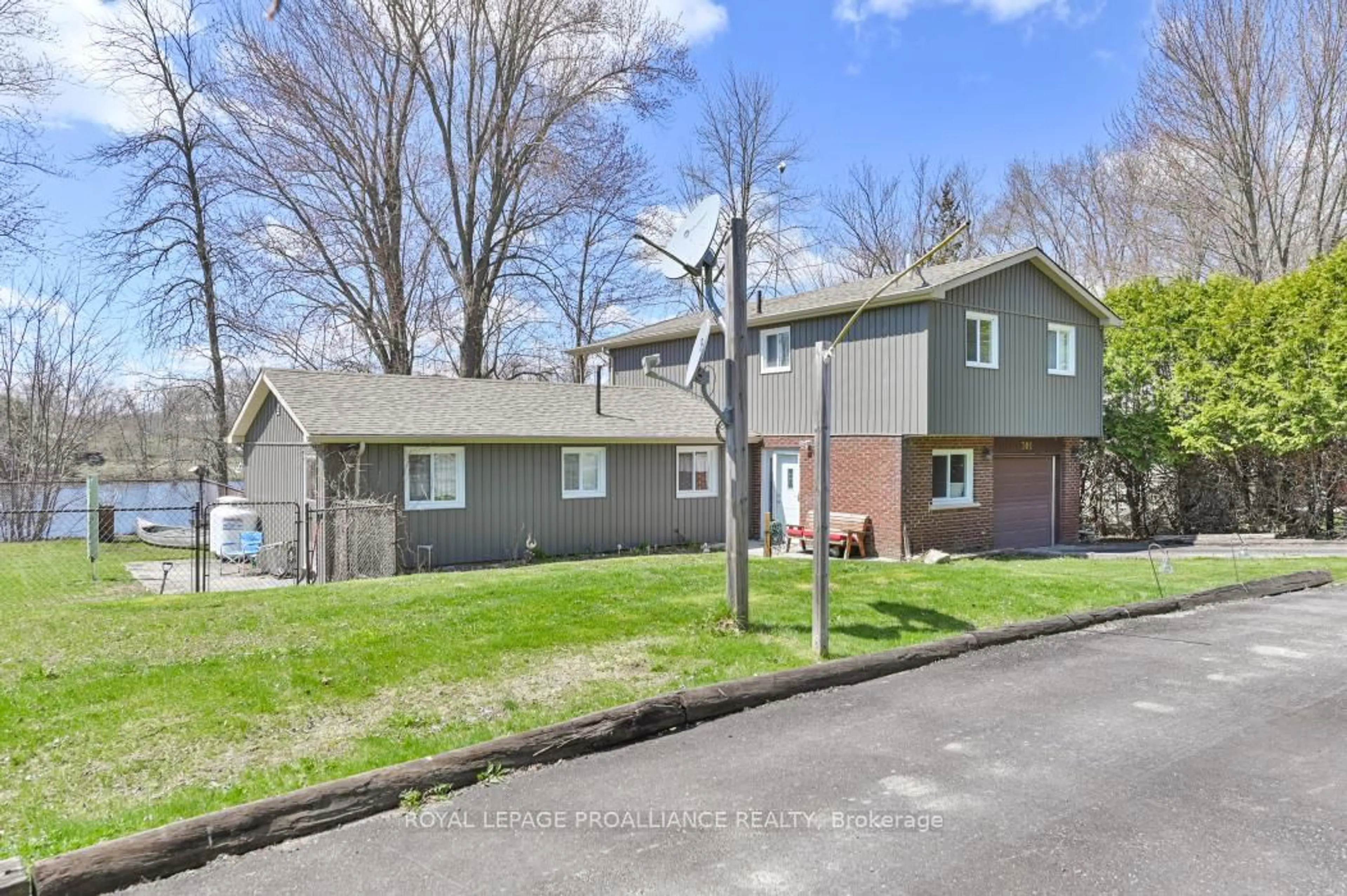 A pic from outside/outdoor area/front of a property/back of a property/a pic from drone, street for 301 Sherry Rd, Thomasburg Ontario K0K 3H0