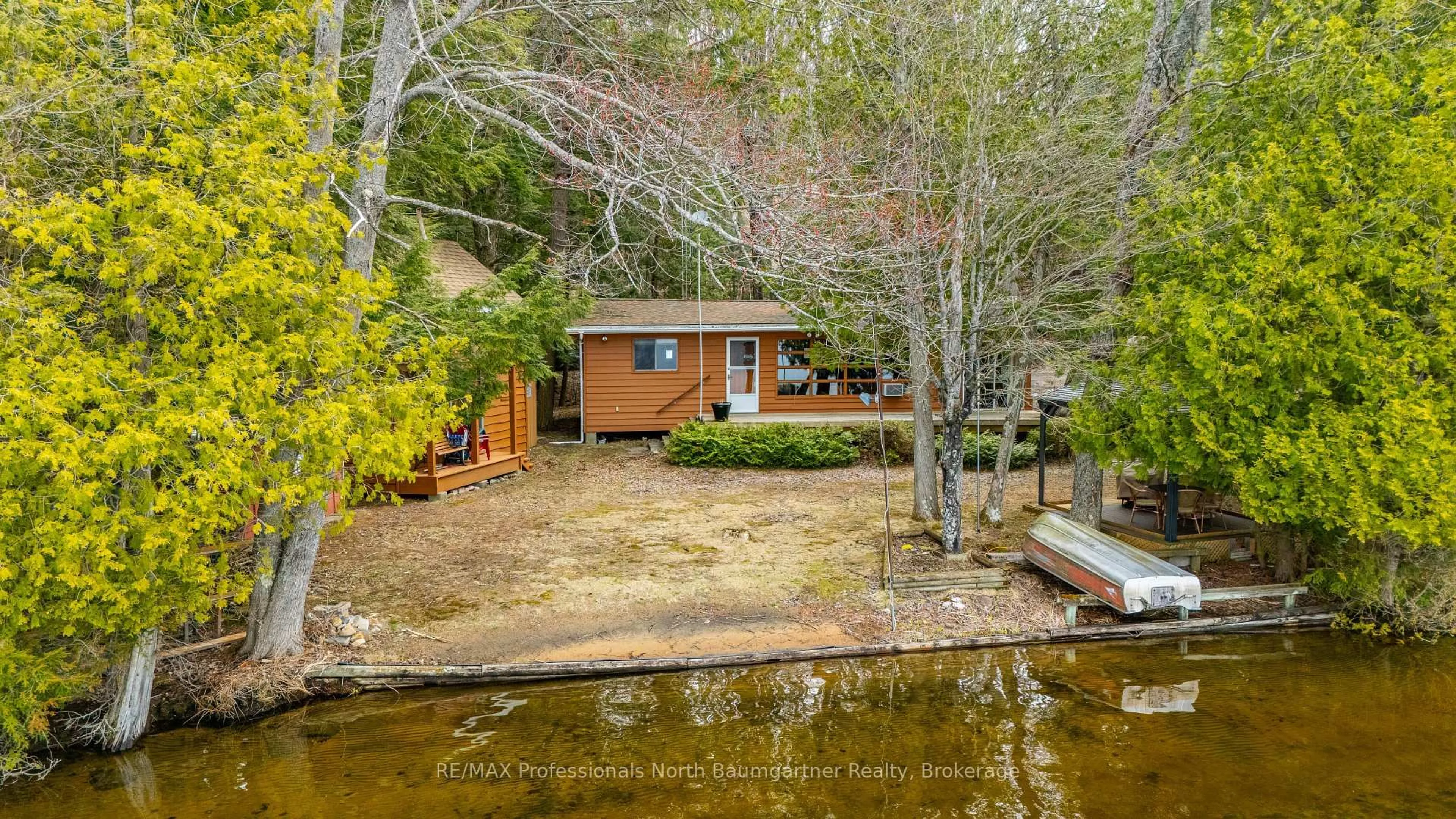 A pic from outside/outdoor area/front of a property/back of a property/a pic from drone, water/lake/river/ocean view for 1189 Marathon Dr, Minden Hills Ontario K0M 2K0