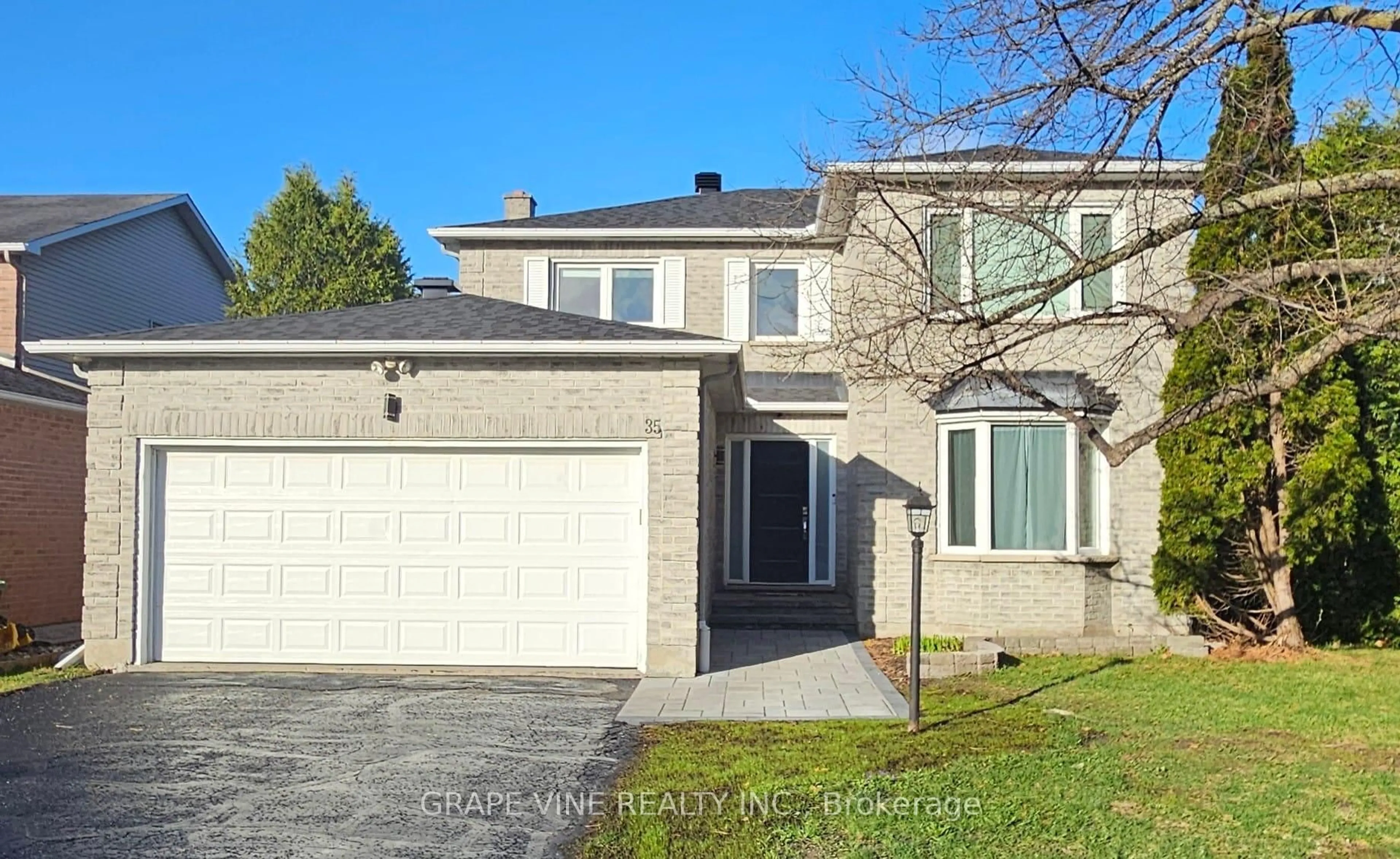 Home with brick exterior material, street for 35 Bluemeadow Way, Kanata Ontario K2M 1L7