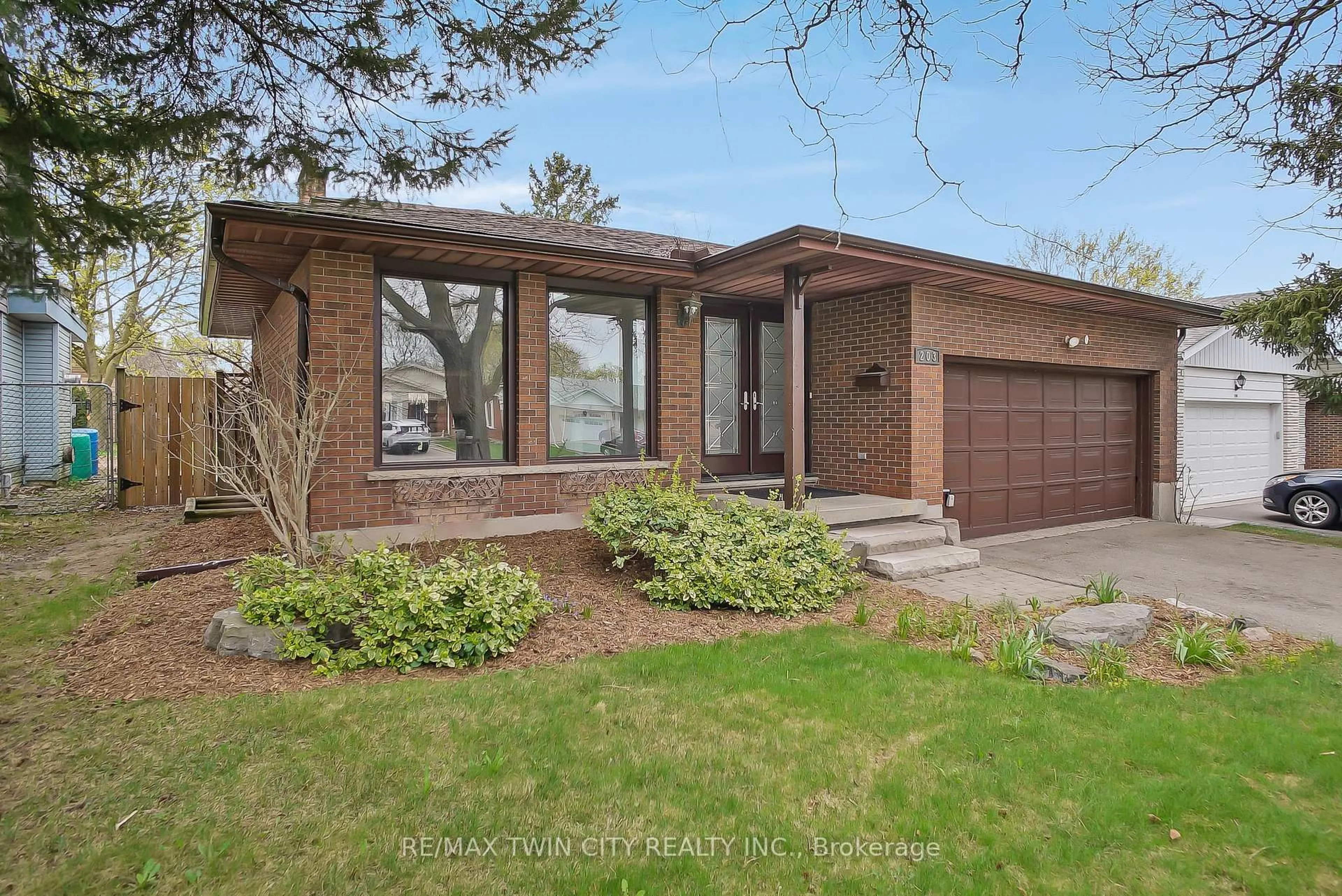 Home with brick exterior material, street for 203 Farrier Dr, Kitchener Ontario N2P 1J1