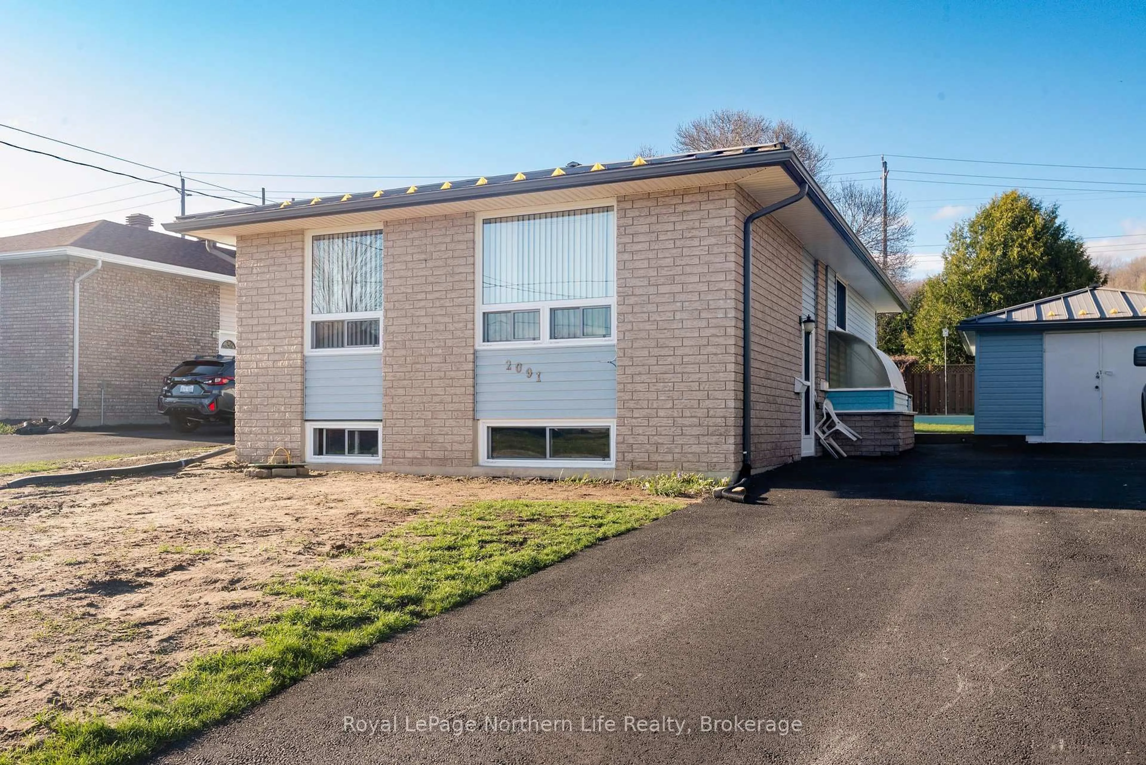Home with brick exterior material, street for 2091 Mckeown Ave, North Bay Ontario P1B 7N8