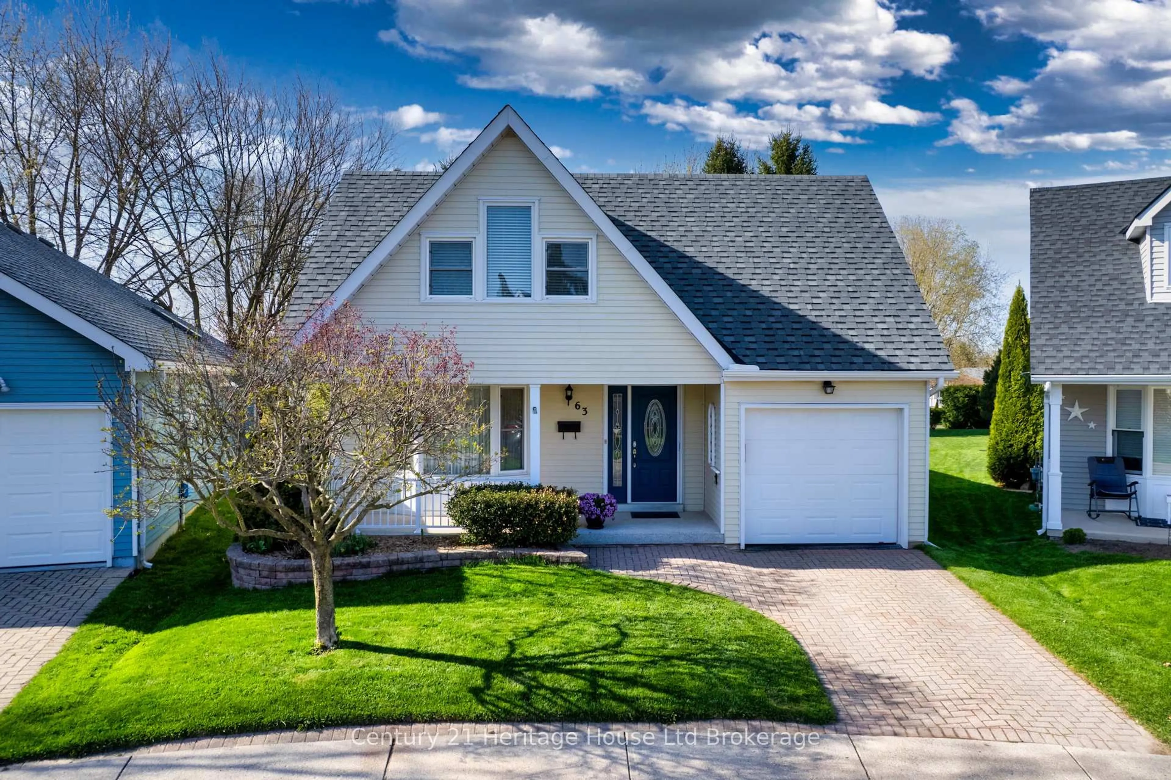 Home with vinyl exterior material, street for 63 Hawkins Cres, Tillsonburg Ontario N4G 5K7